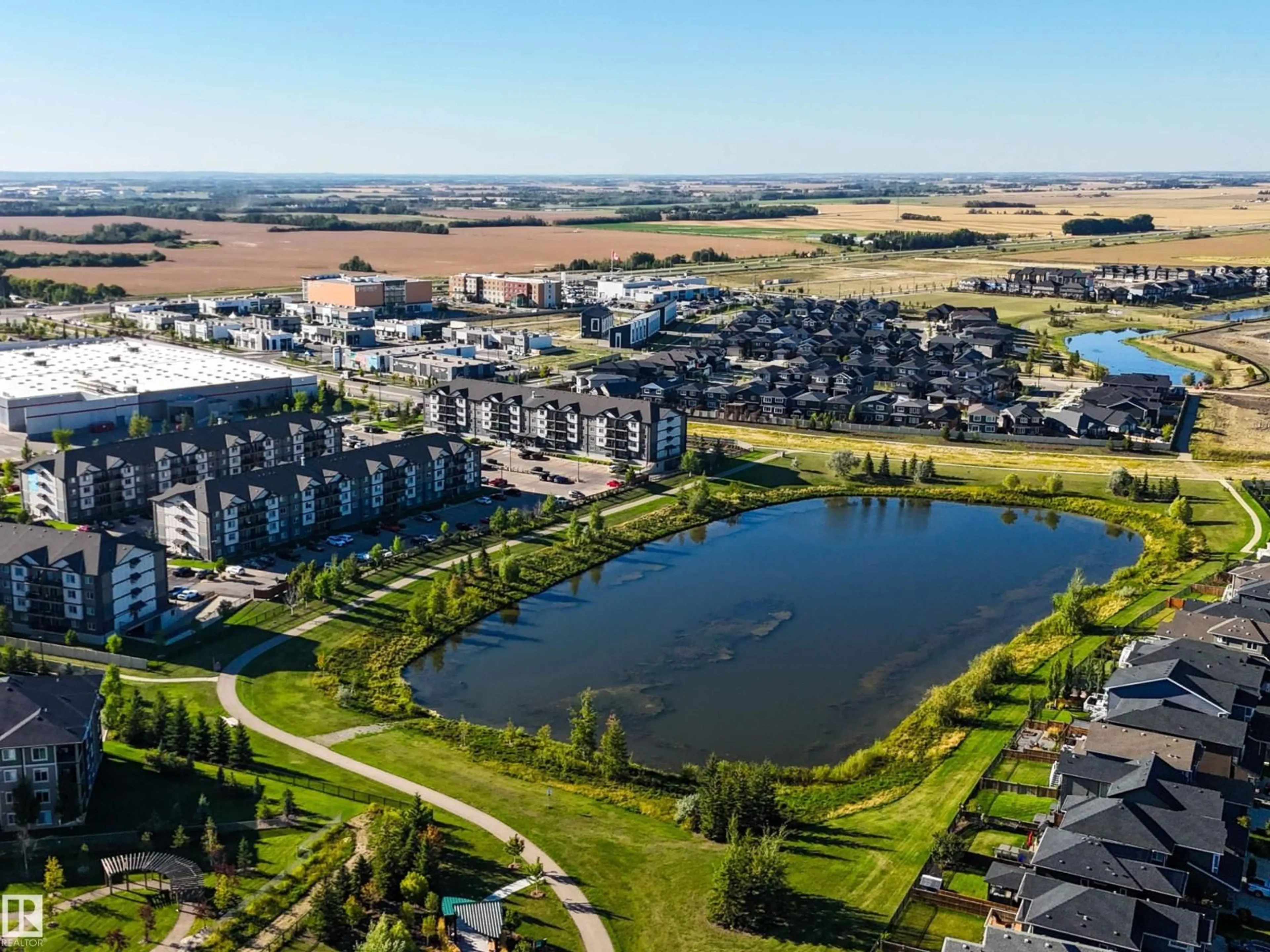 A pic from outside/outdoor area/front of a property/back of a property/a pic from drone, water/lake/river/ocean view for 204 25 ELEMENT DR, St. Albert Alberta T8N7S1