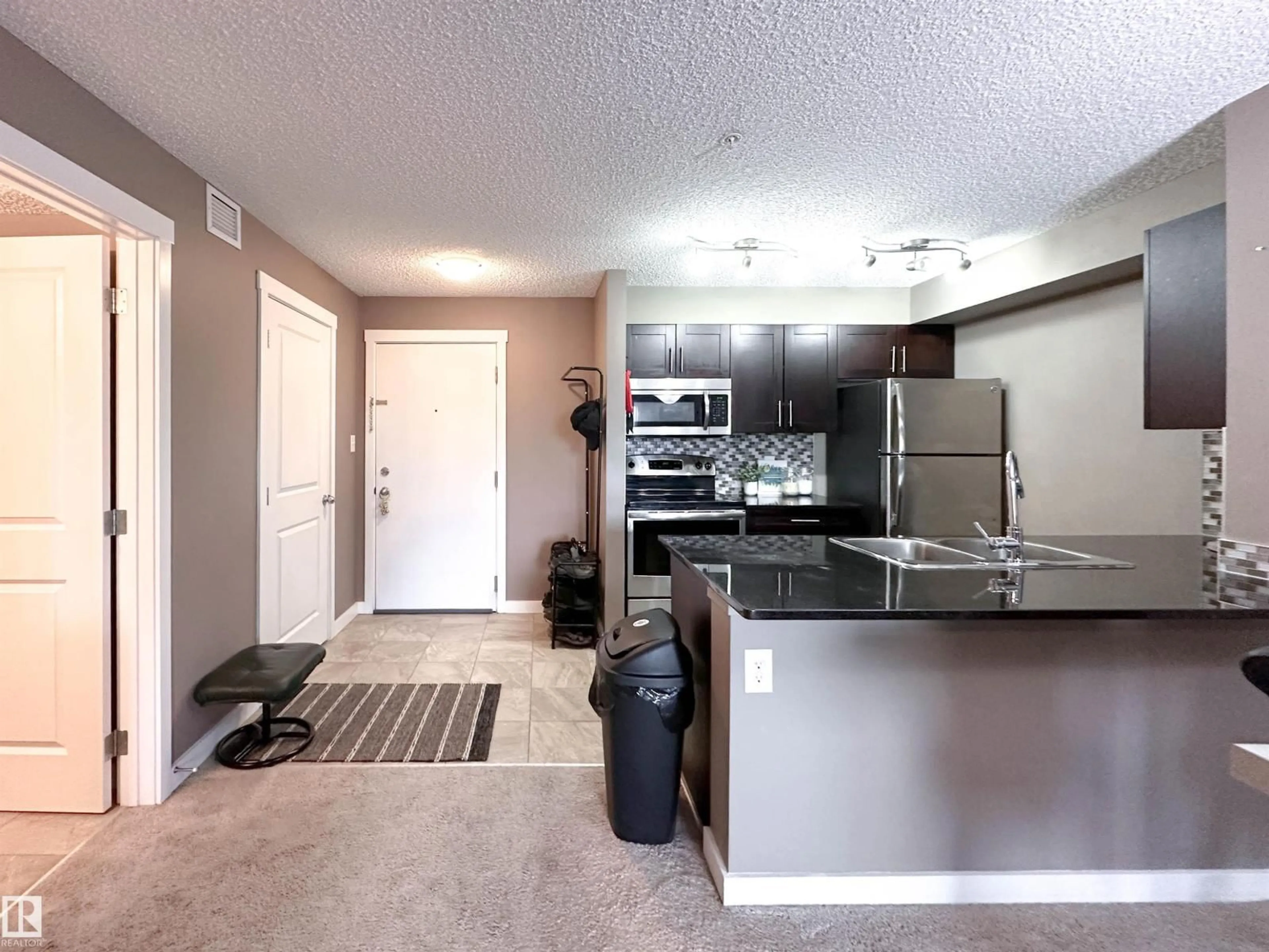 Open concept kitchen, unknown for 204 25 ELEMENT DR, St. Albert Alberta T8N7S1