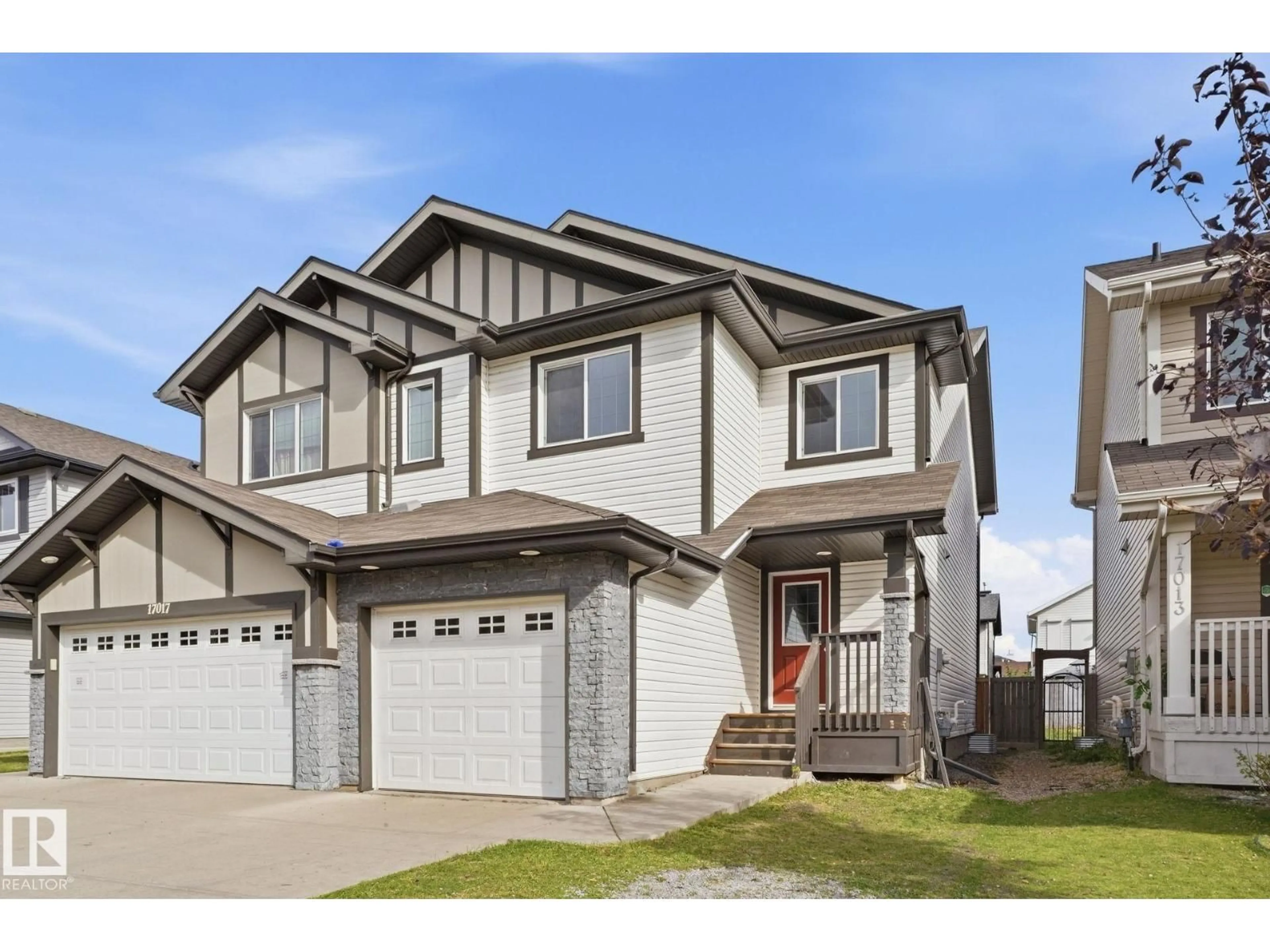 Home with vinyl exterior material, street for NW - 17015 120 ST, Edmonton Alberta T5X0H6