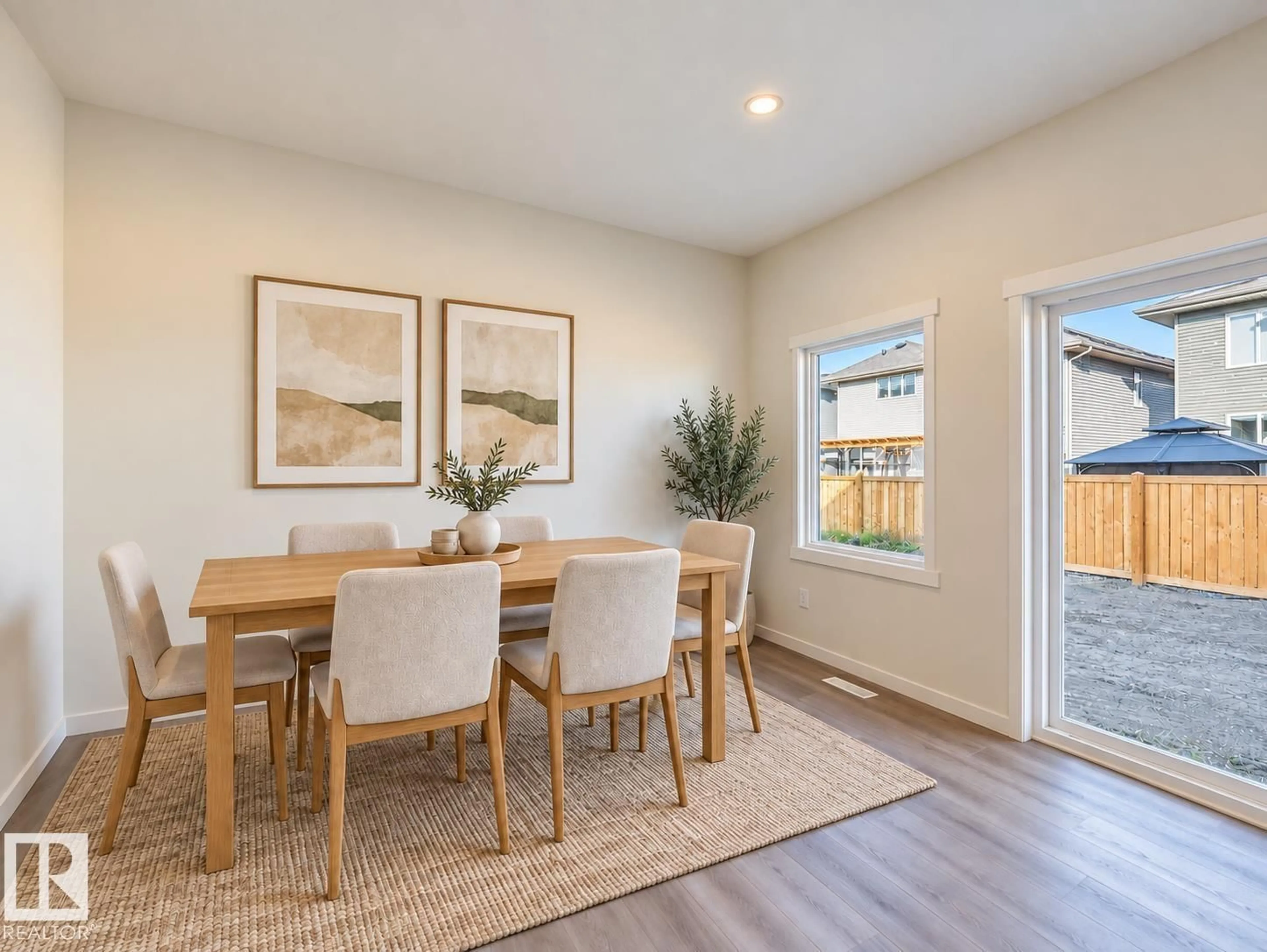 Dining room, wood/laminate floor for NW - 2427 206 ST, Edmonton Alberta T6M1N9