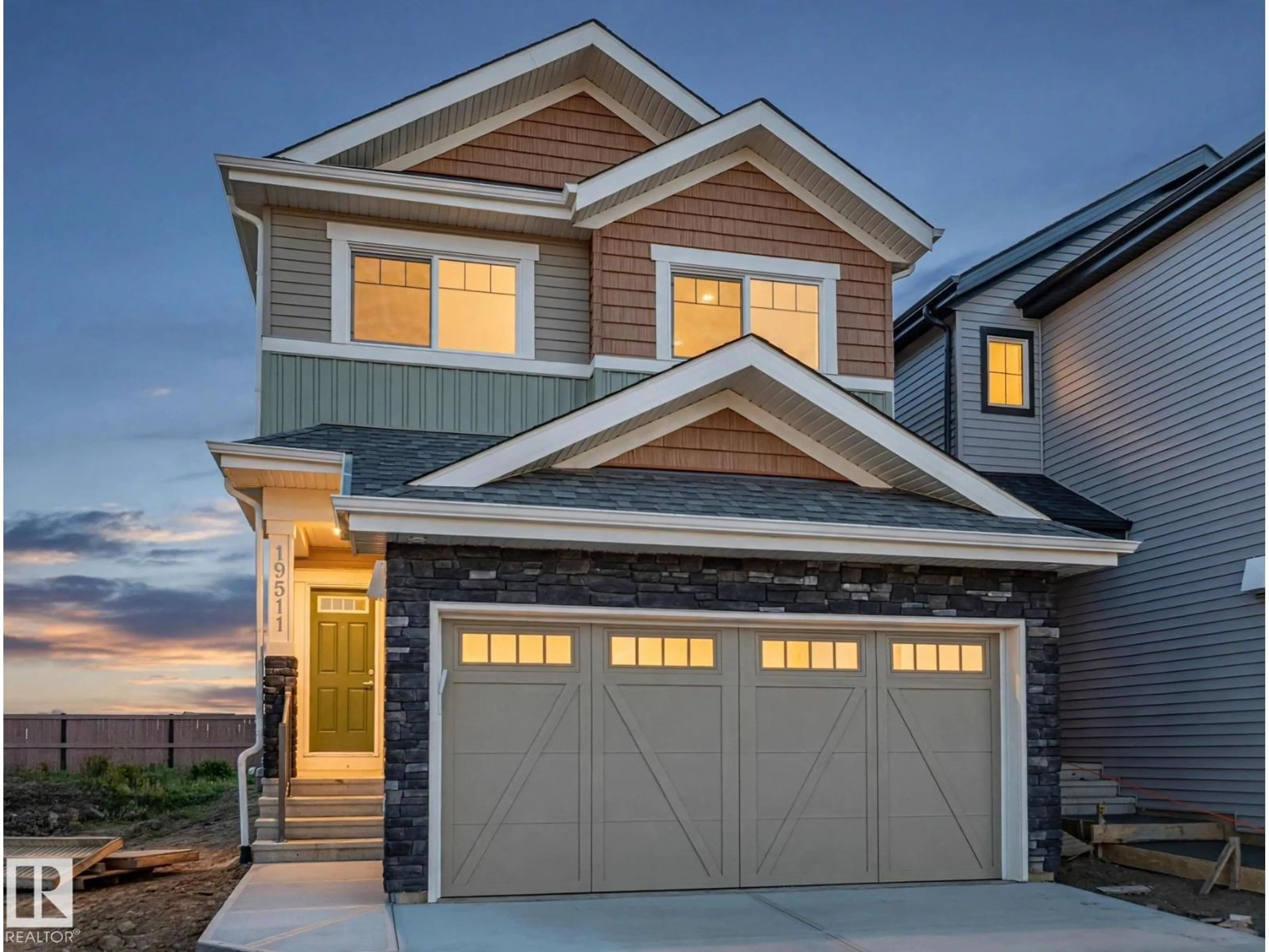 Home with vinyl exterior material, street for 19511 30 AV, Edmonton Alberta T6M3M1