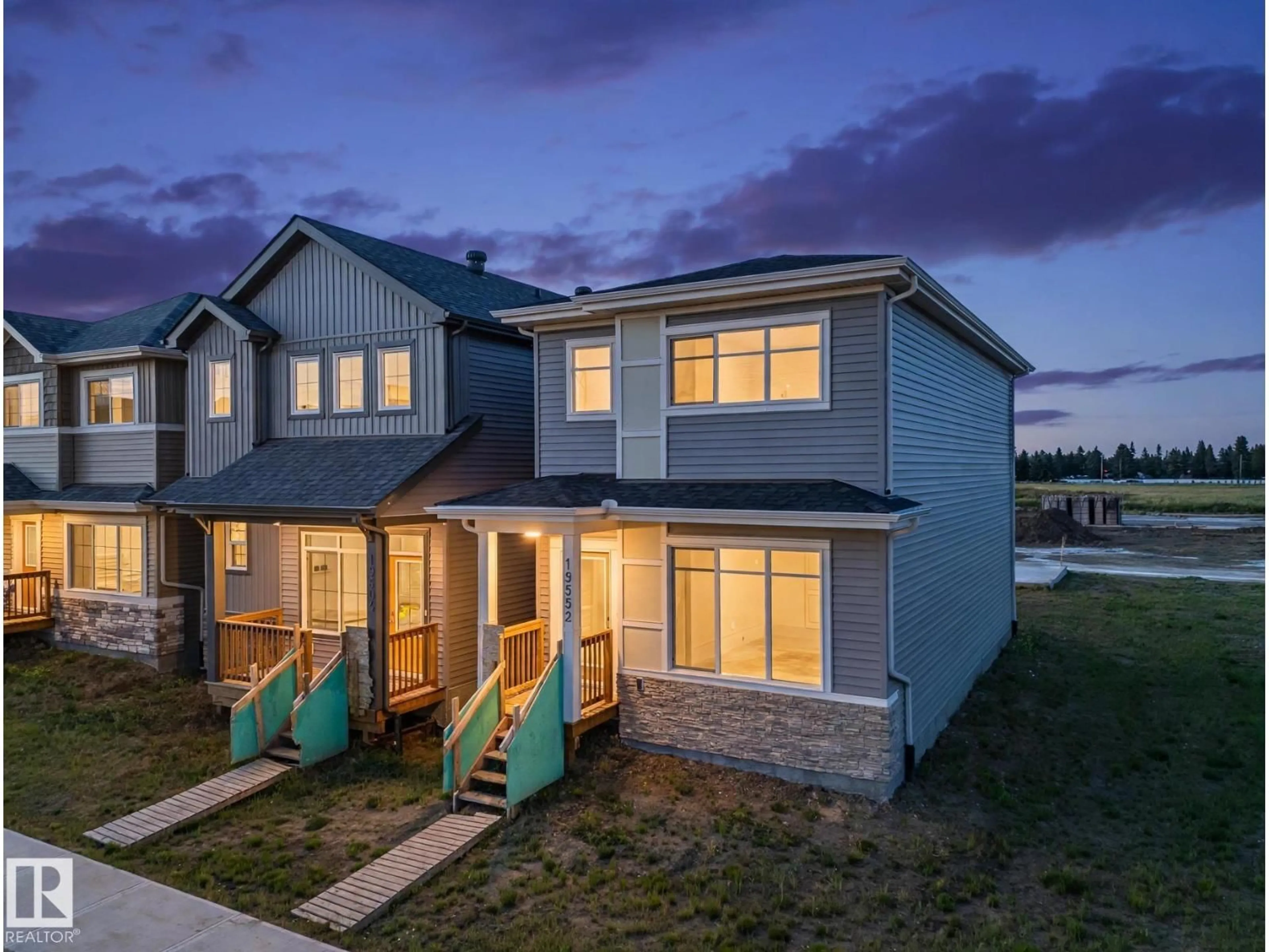 Home with vinyl exterior material, street for NW - 19552 30 AV, Edmonton Alberta T5T6L5