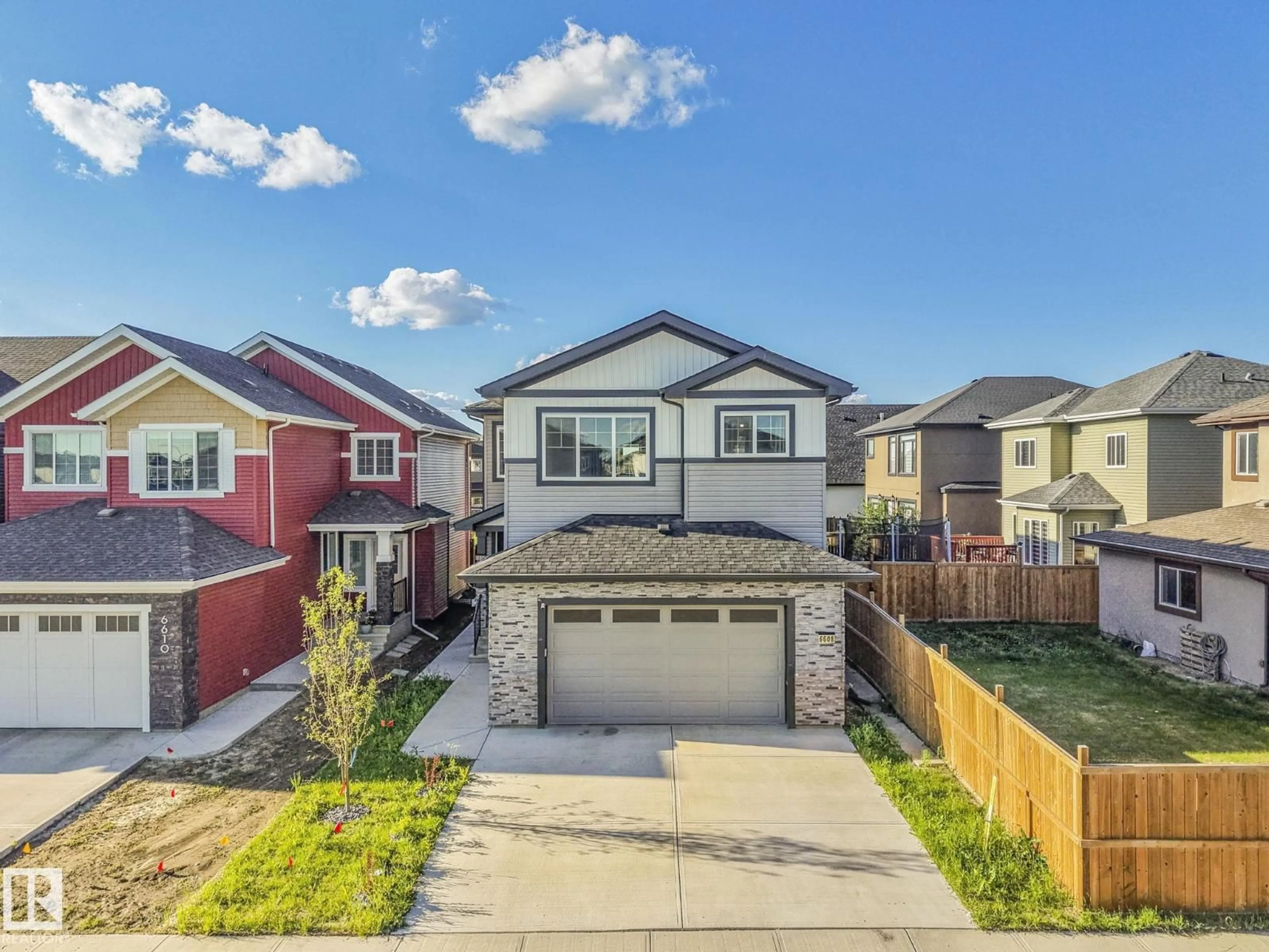 Home with vinyl exterior material, street for 6608 51 AV, Beaumont Alberta T4X2A3