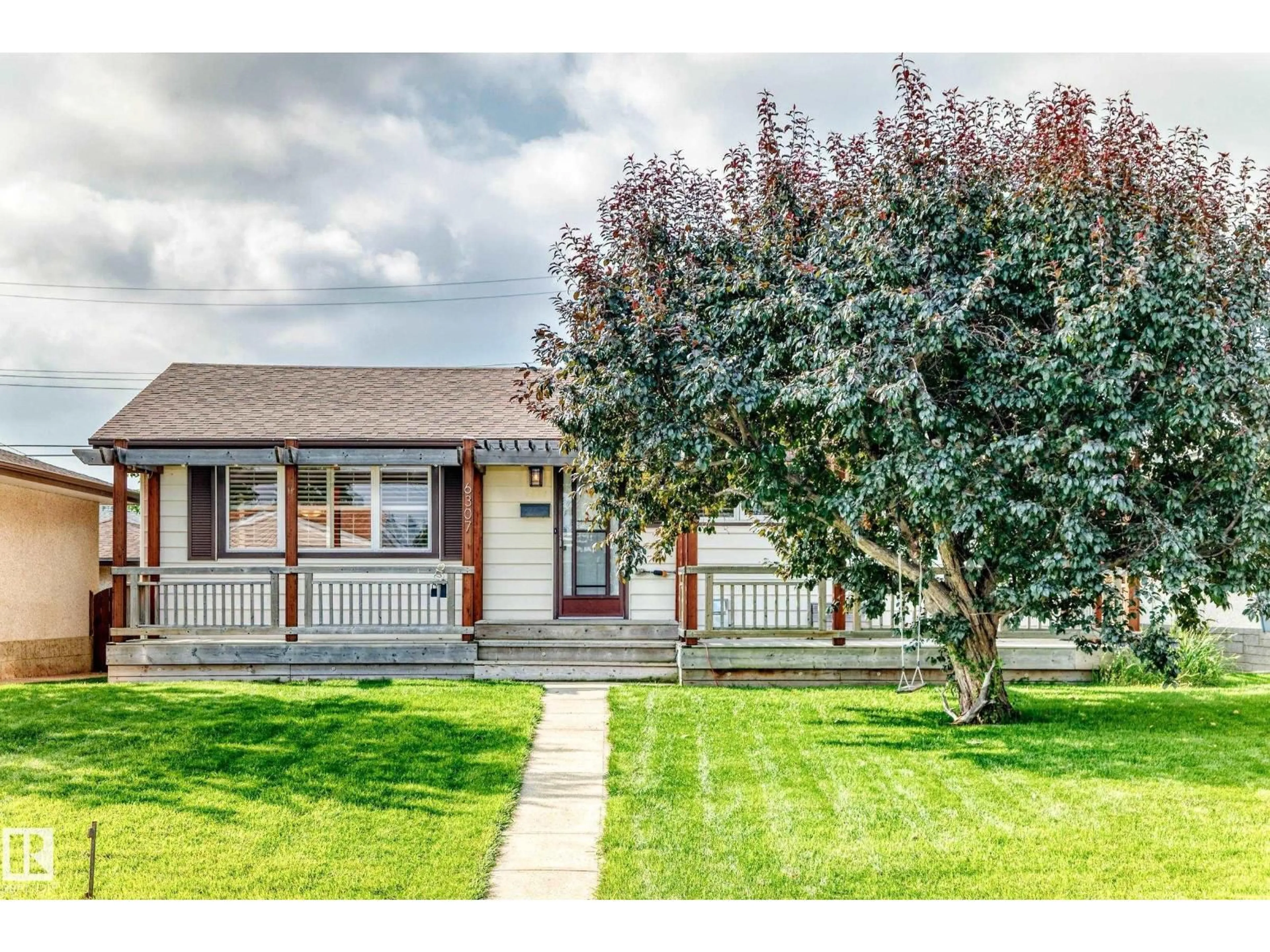 Home with vinyl exterior material, street for 6307 92A AV, Edmonton Alberta T6B0T5