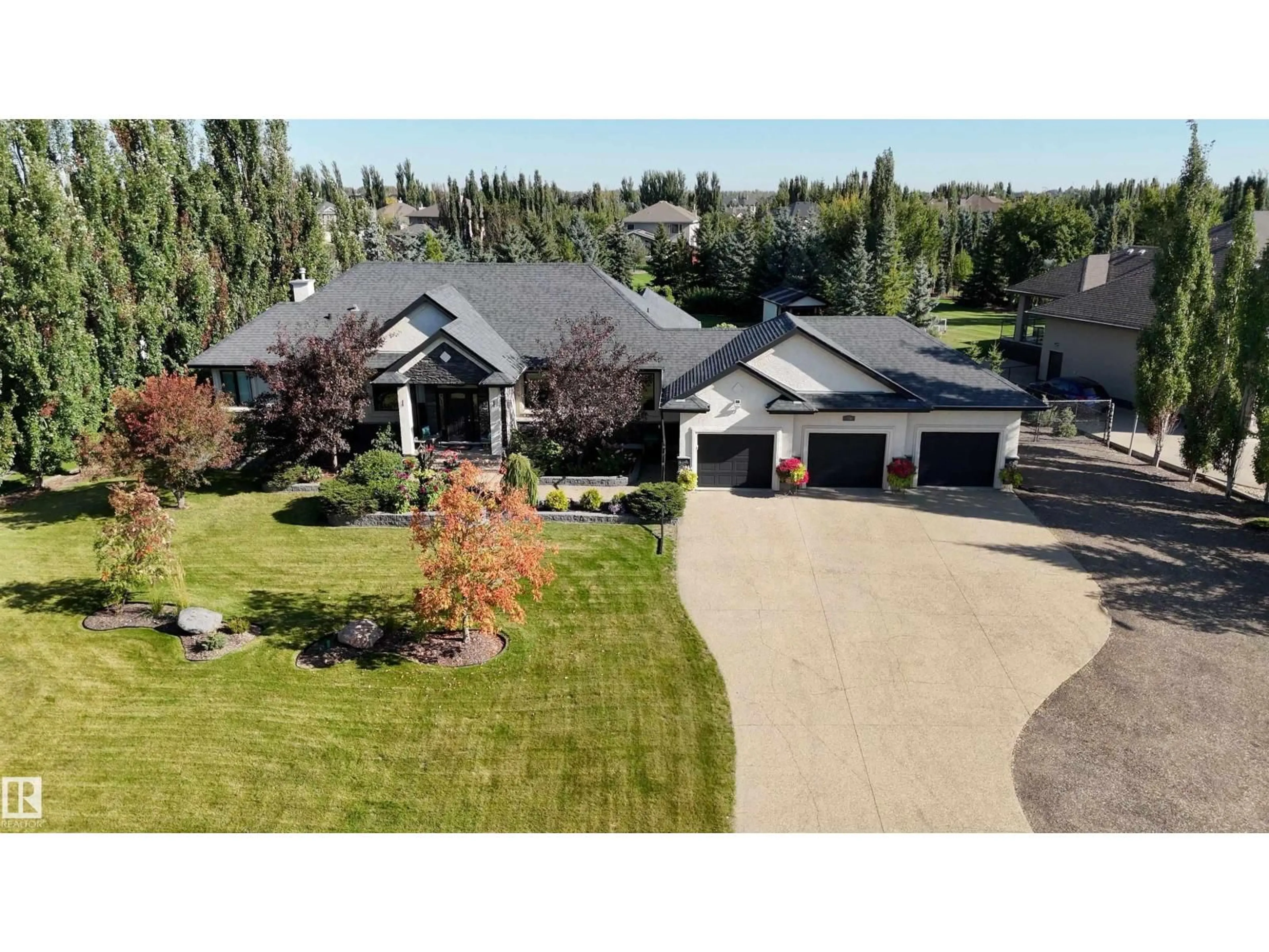 A pic from outside/outdoor area/front of a property/back of a property/a pic from drone, street for 54418 - 238 RGE ROAD 251, Rural Sturgeon County Alberta T8T0C7