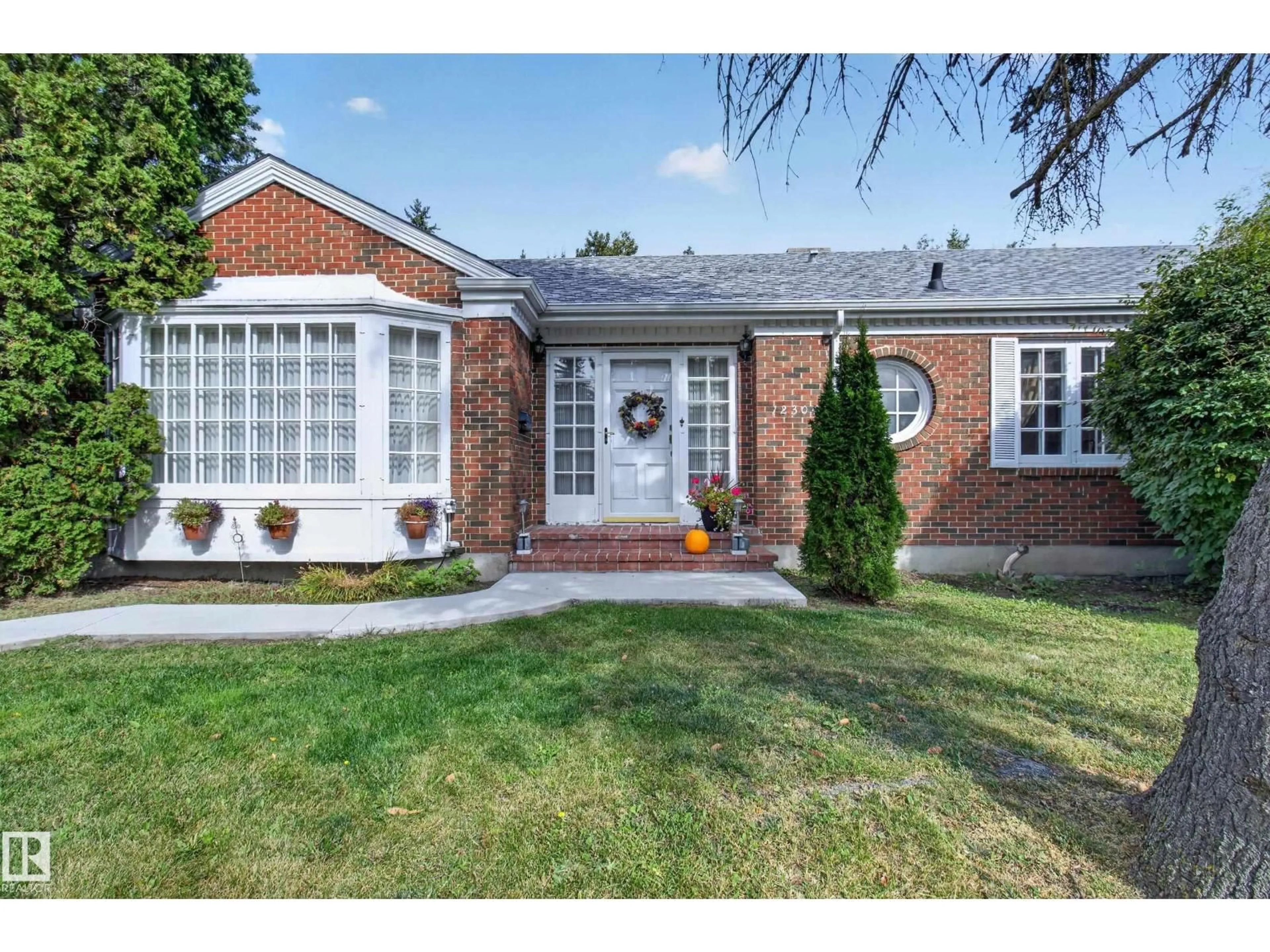 Home with brick exterior material, street for 12304 GRAND VIEW DR, Edmonton Alberta T6H4K4