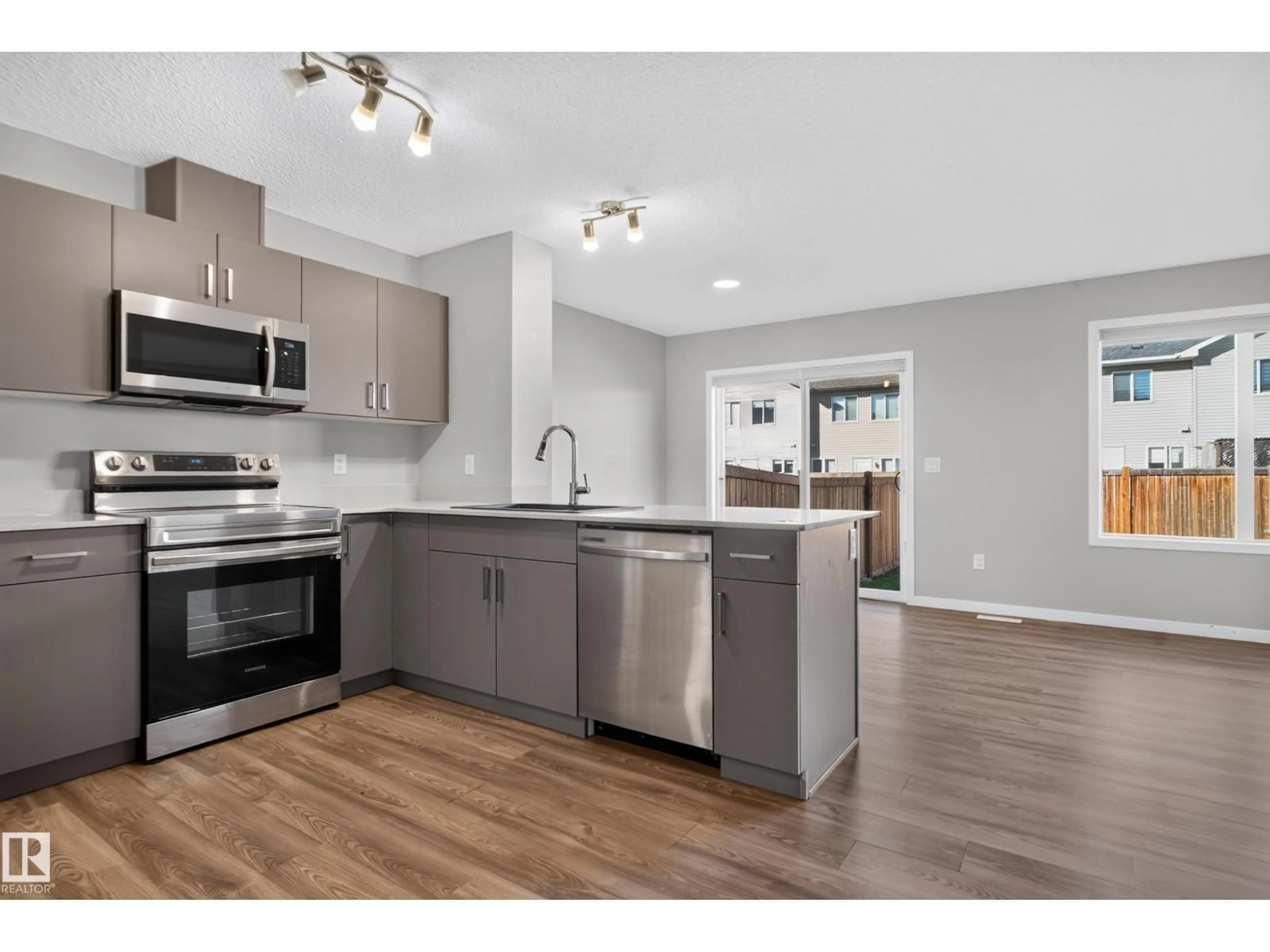 Open concept kitchen, unknown for SW - 9330 COOPER BN, Edmonton Alberta T6W4M4