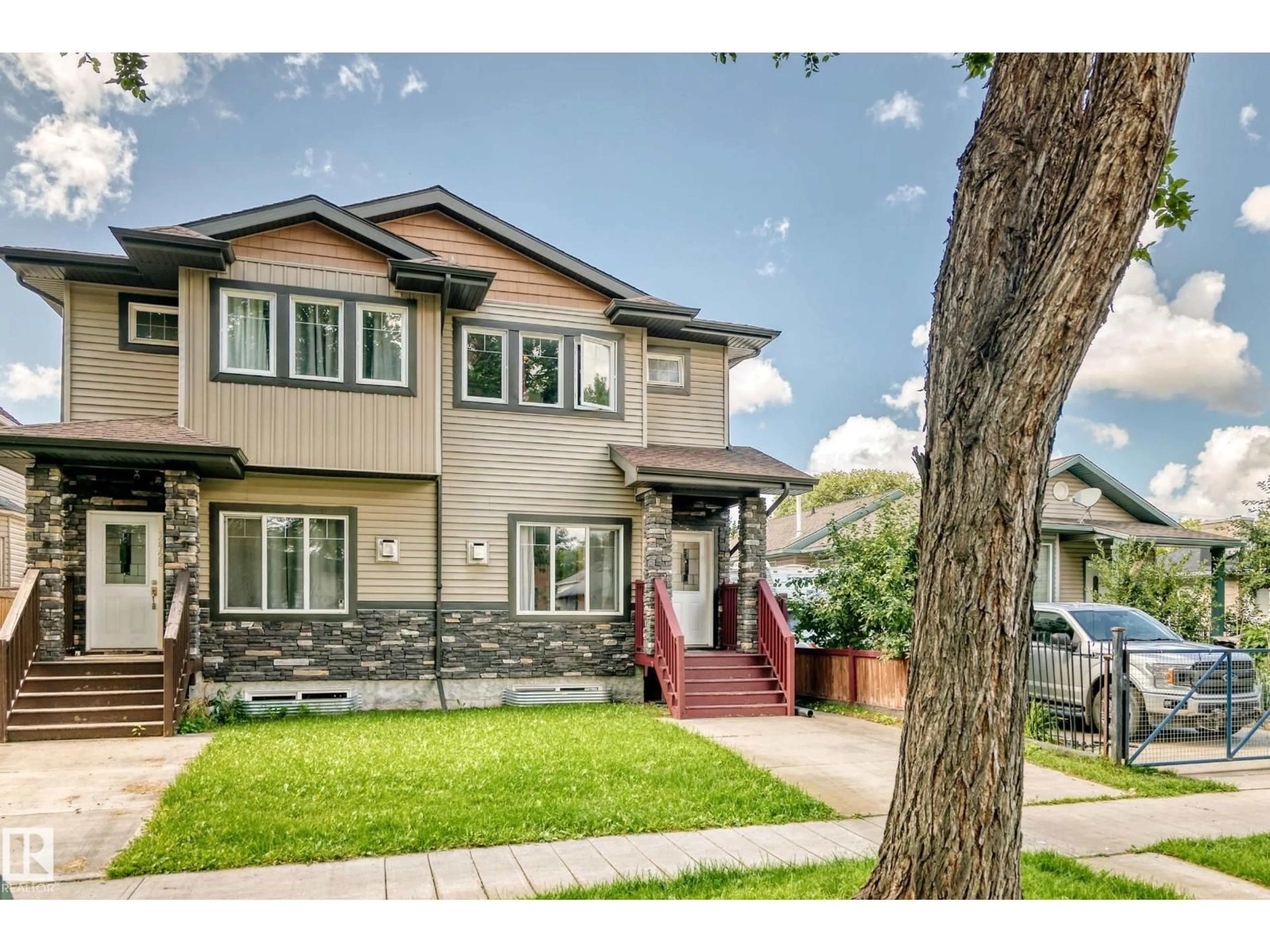 Home with vinyl exterior material, street for NW - 12730 118 ST, Edmonton Alberta T5E5K8