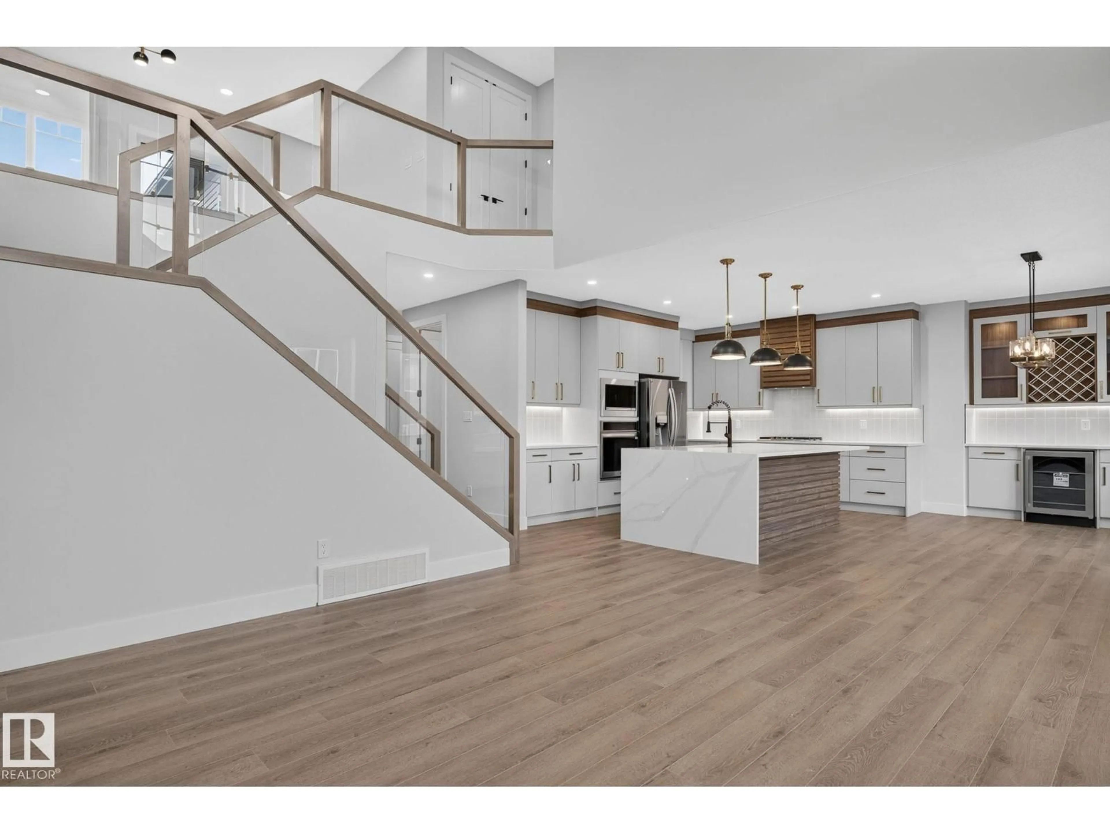 Open concept kitchen, wood/laminate floor for 15 HILLWOOD TC, Spruce Grove Alberta T7X0X4