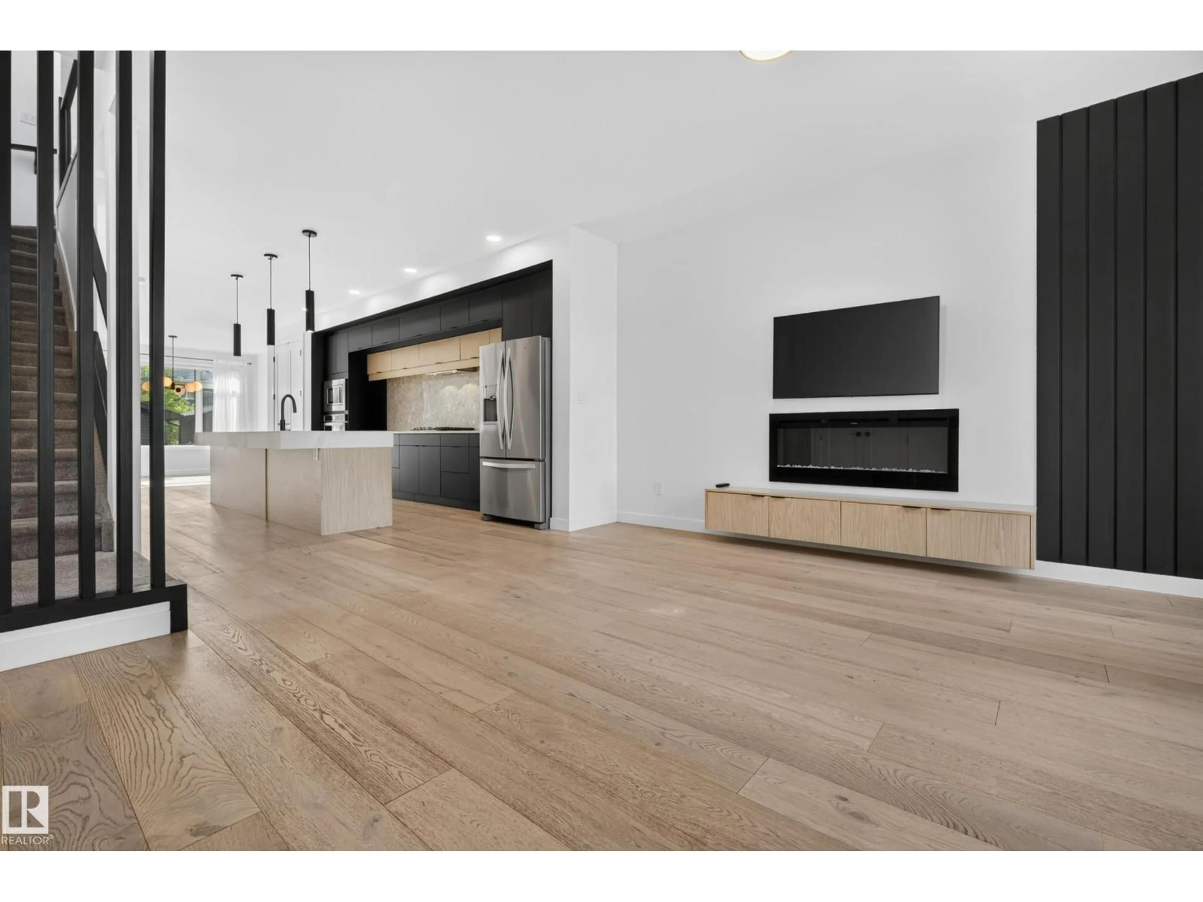 Open concept kitchen, wood/laminate floor for 11207 75 AV, Edmonton Alberta T6G0H4