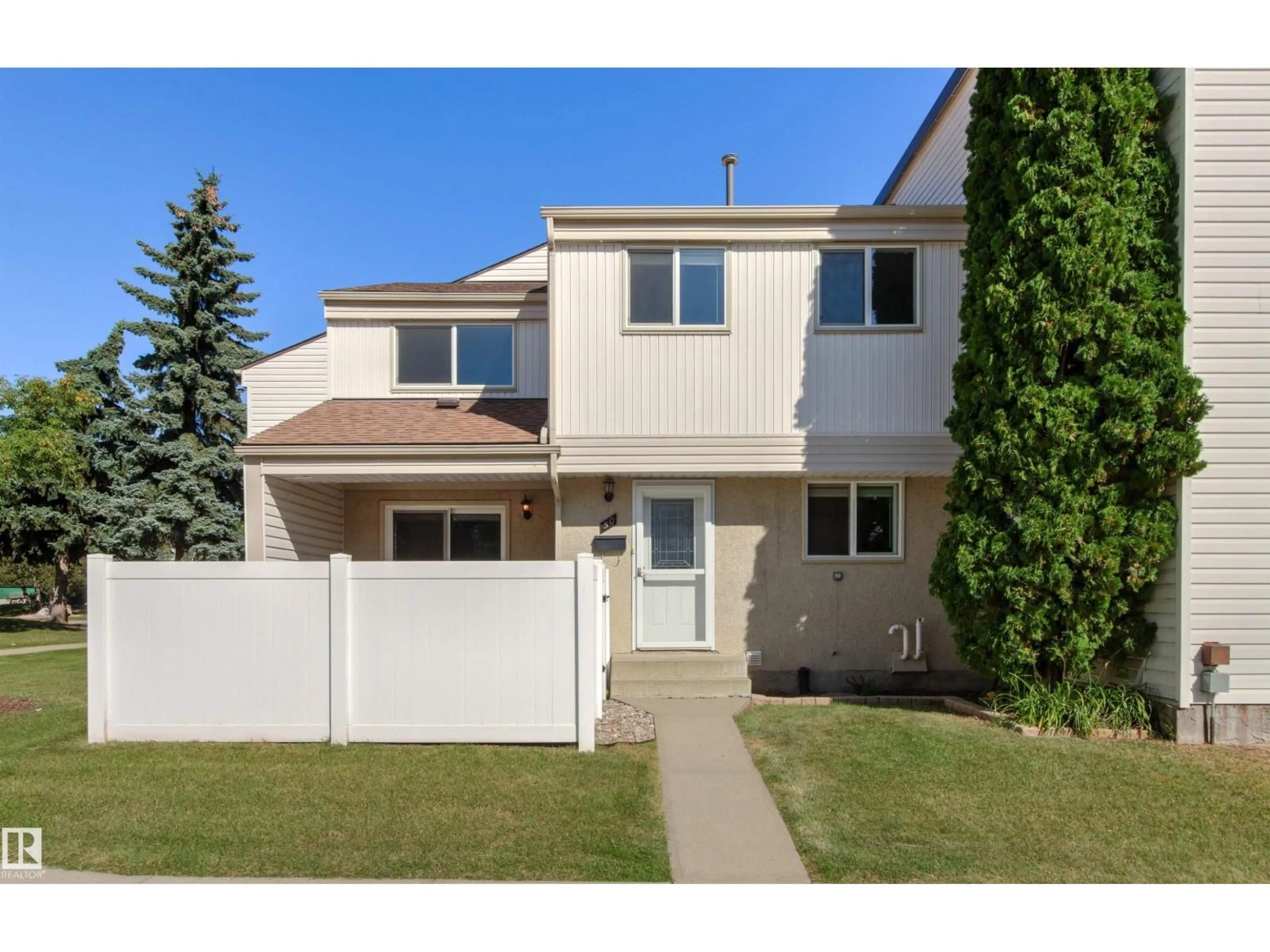 Home with vinyl exterior material, street for 50 WOODVALE VG, Edmonton Alberta T6L1W4