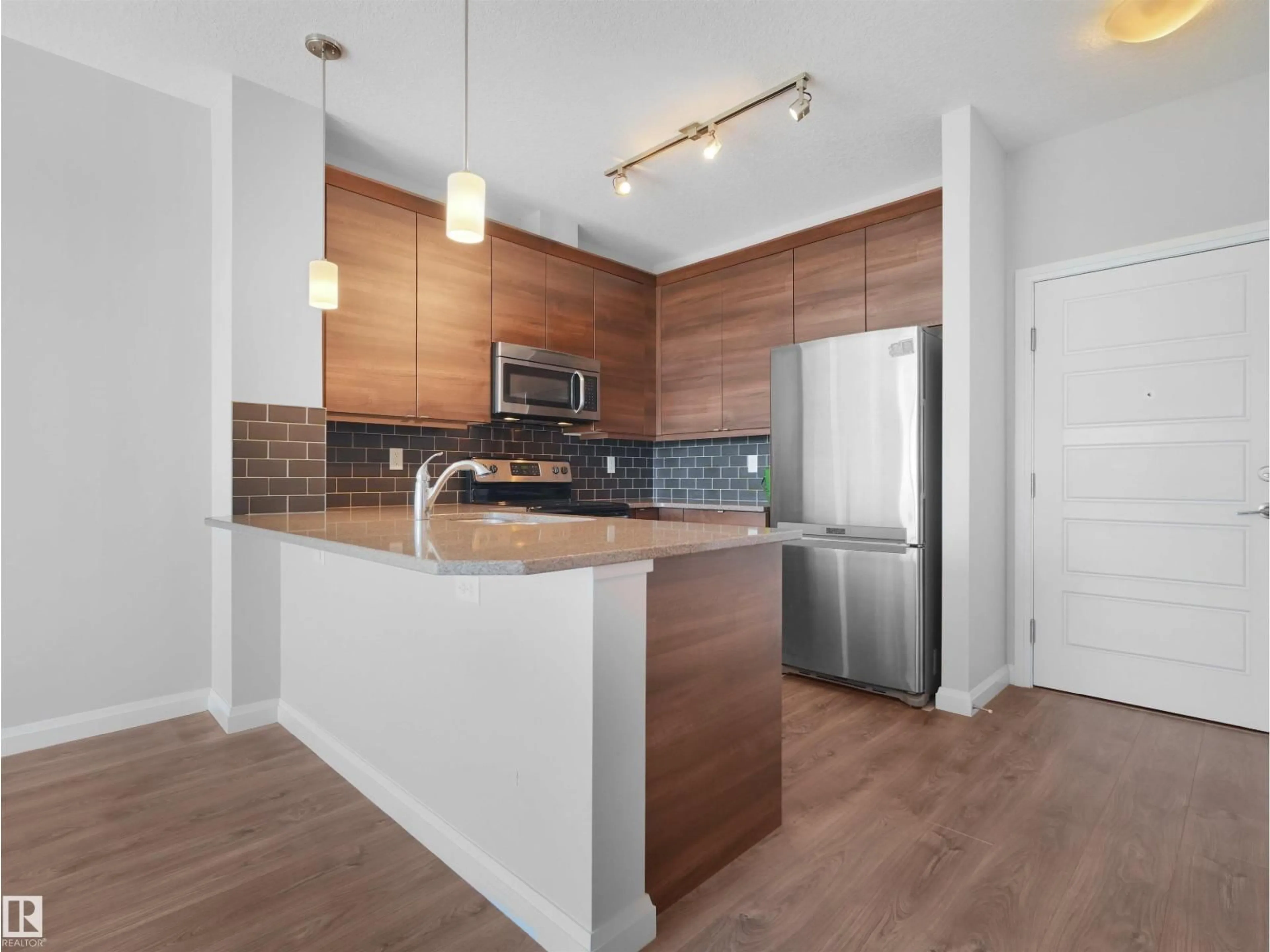 Open concept kitchen, wood/laminate floor for 2588 - 415 ANDERSON WY, Edmonton Alberta T6W0R2
