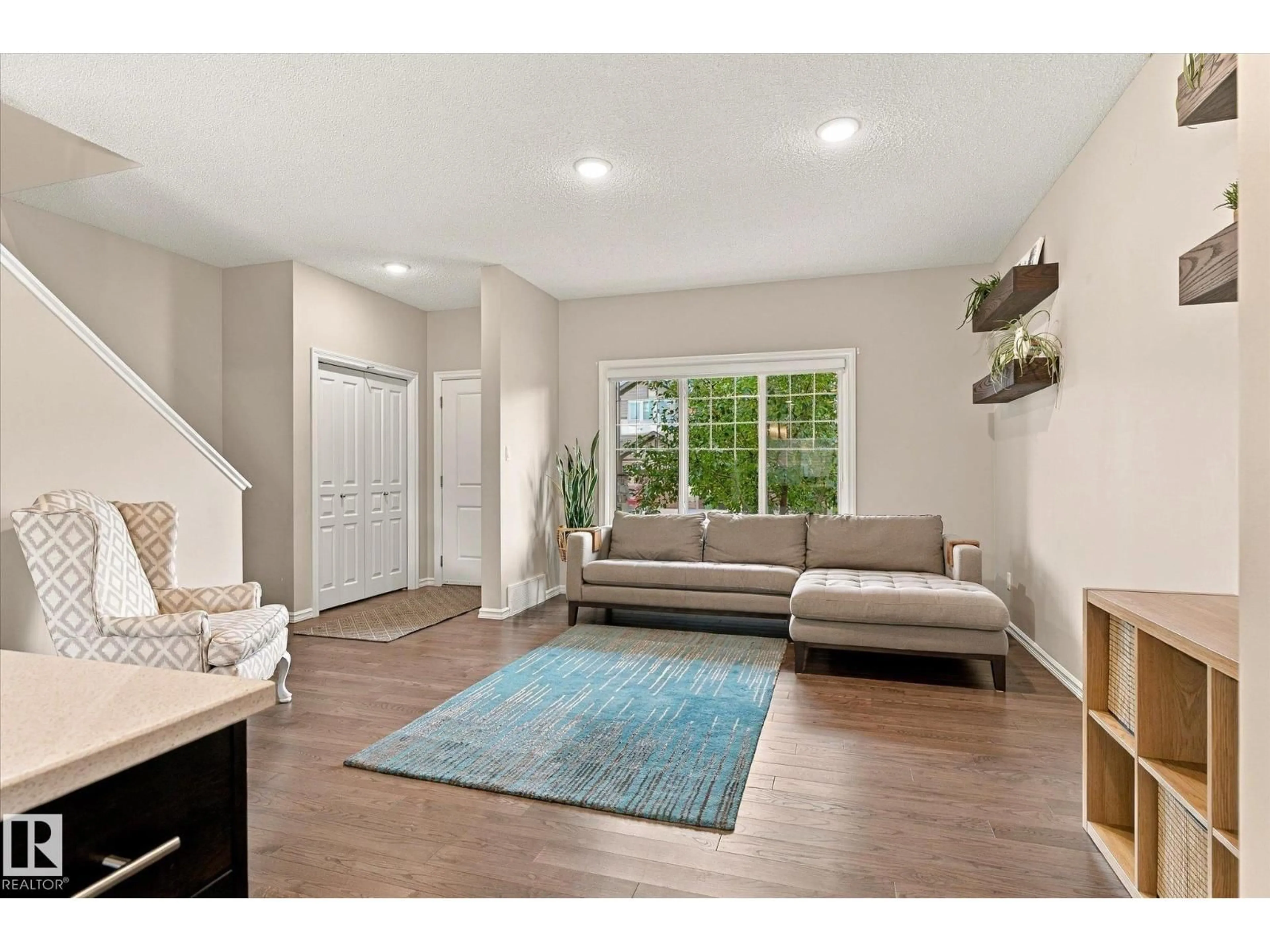 Living room with furniture, unknown for 21935 91 AV, Edmonton Alberta T5T6Z8