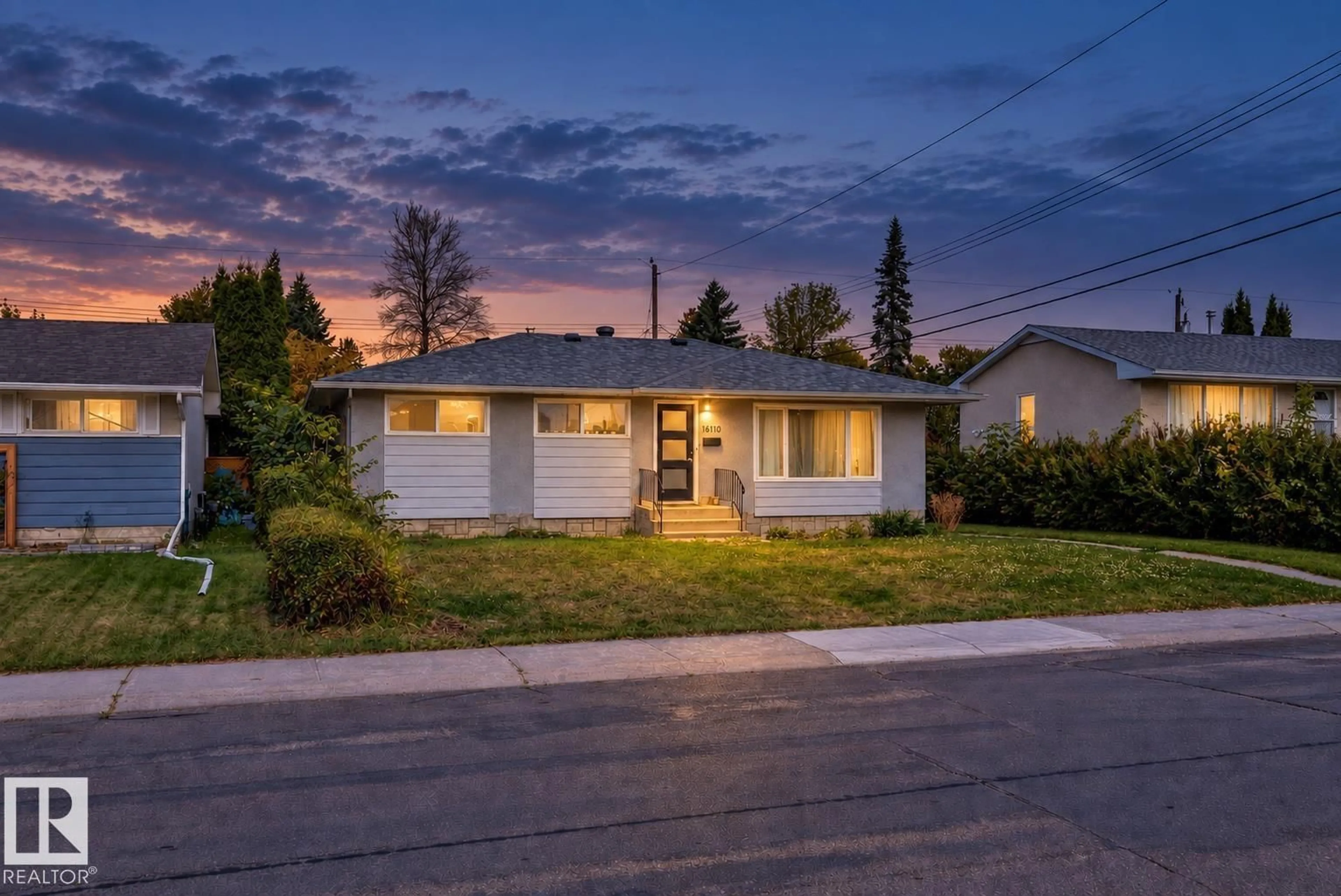 Home with vinyl exterior material, street for 16110 82 AV, Edmonton Alberta T5R3S4