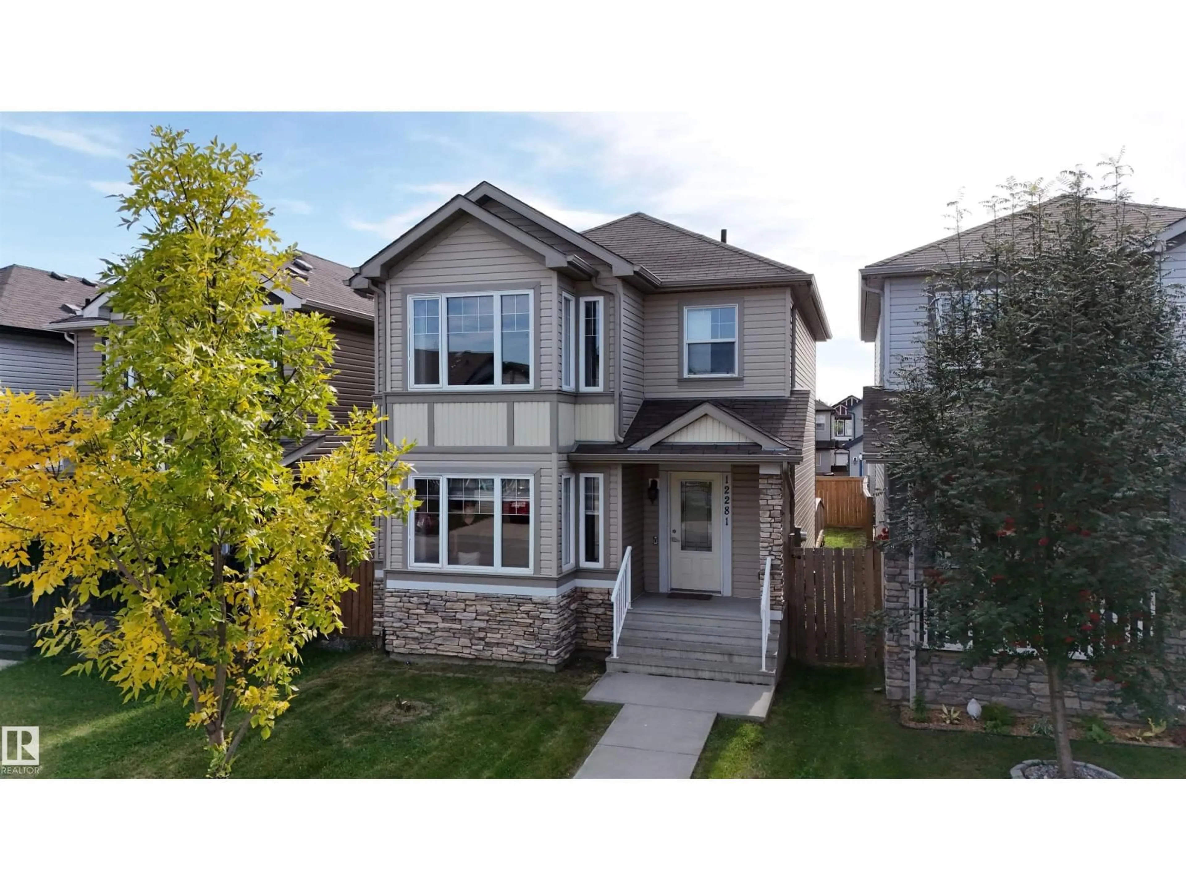 Home with vinyl exterior material, street for 12281 173A AV, Edmonton Alberta T5X0J8