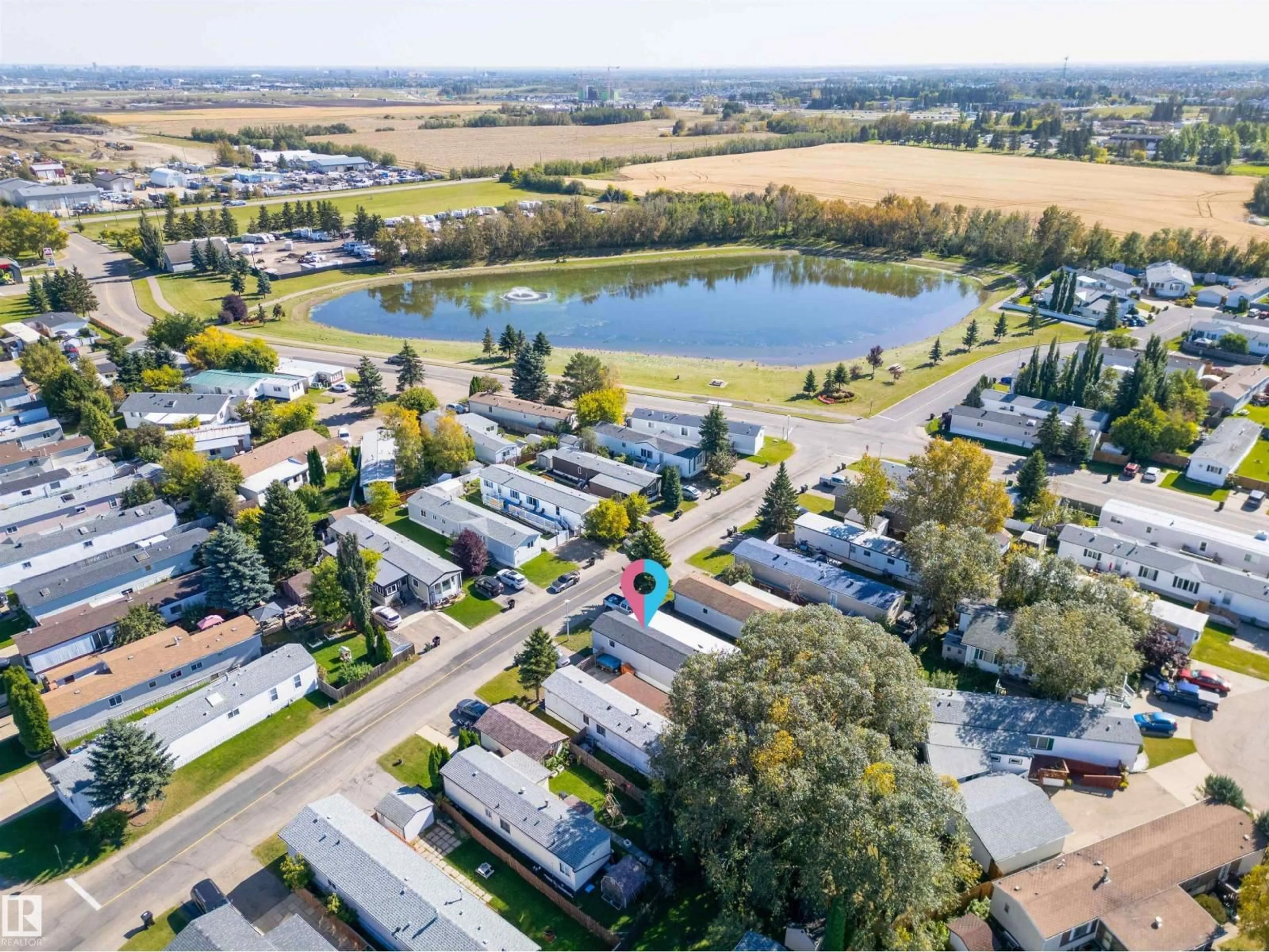 A pic from outside/outdoor area/front of a property/back of a property/a pic from drone, water/lake/river/ocean view for 10770 - 2514 WINTERBURN RD, Edmonton Alberta T5G1T7