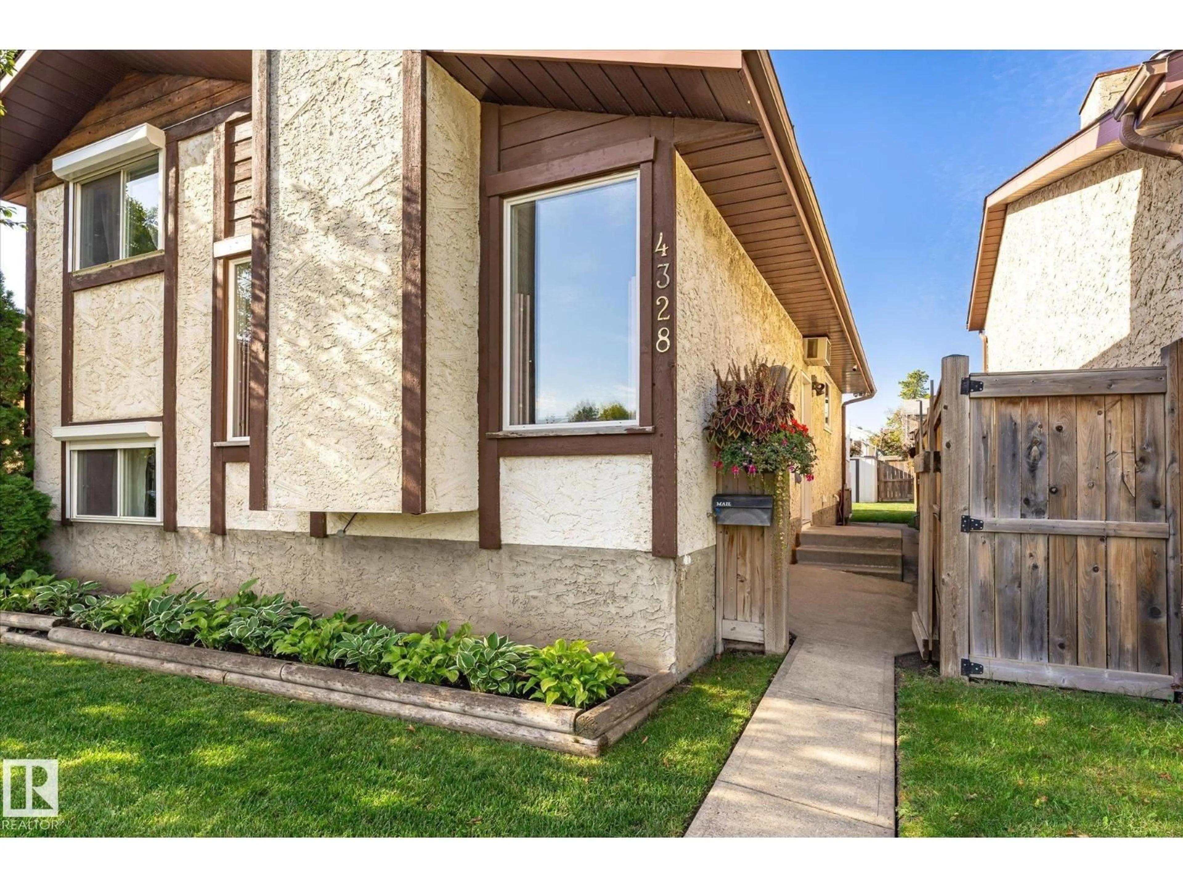 Home with brick exterior material, street for 4328 38 ST, Edmonton Alberta T6L4K4