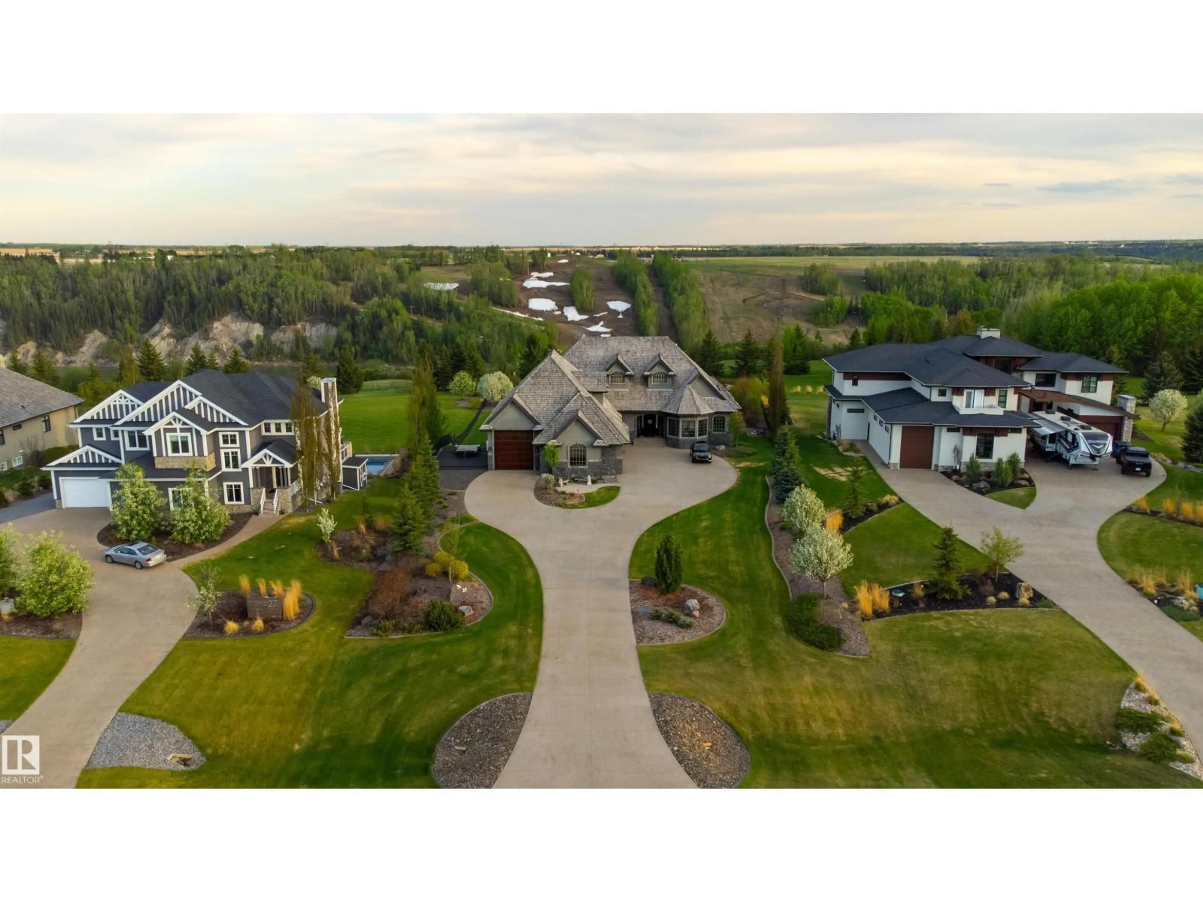 A pic from outside/outdoor area/front of a property/back of a property/a pic from drone, mountain view for A - 25515 TWP ROAD 511, Rural Parkland County Alberta T7Y1A8