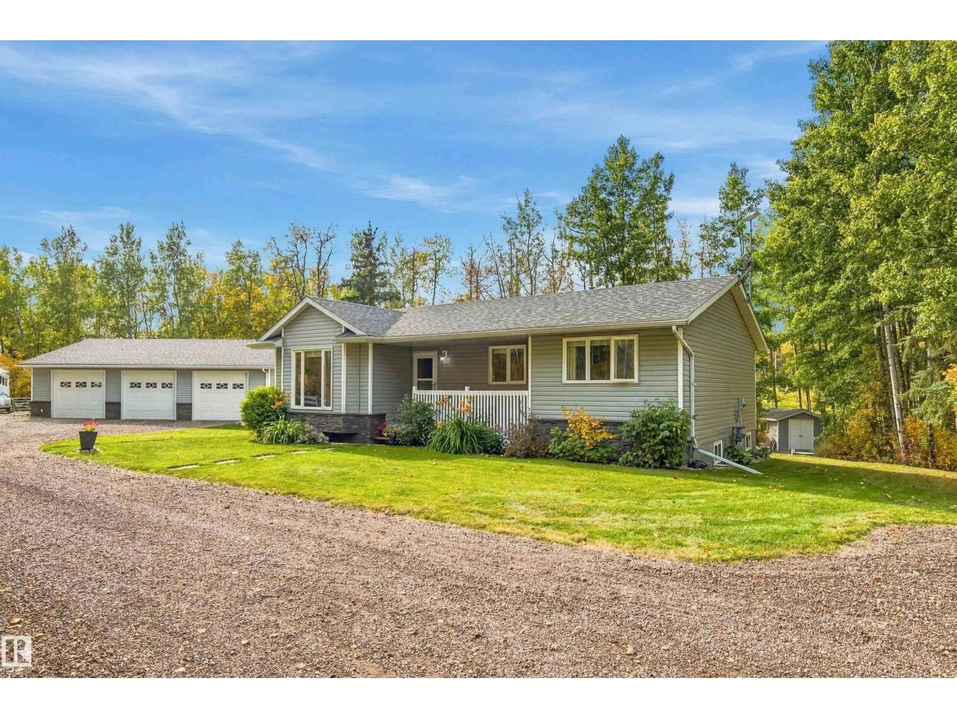 Home with vinyl exterior material, street for 51064 RGE RD 222, Rural Strathcona County Alberta T8C1G9