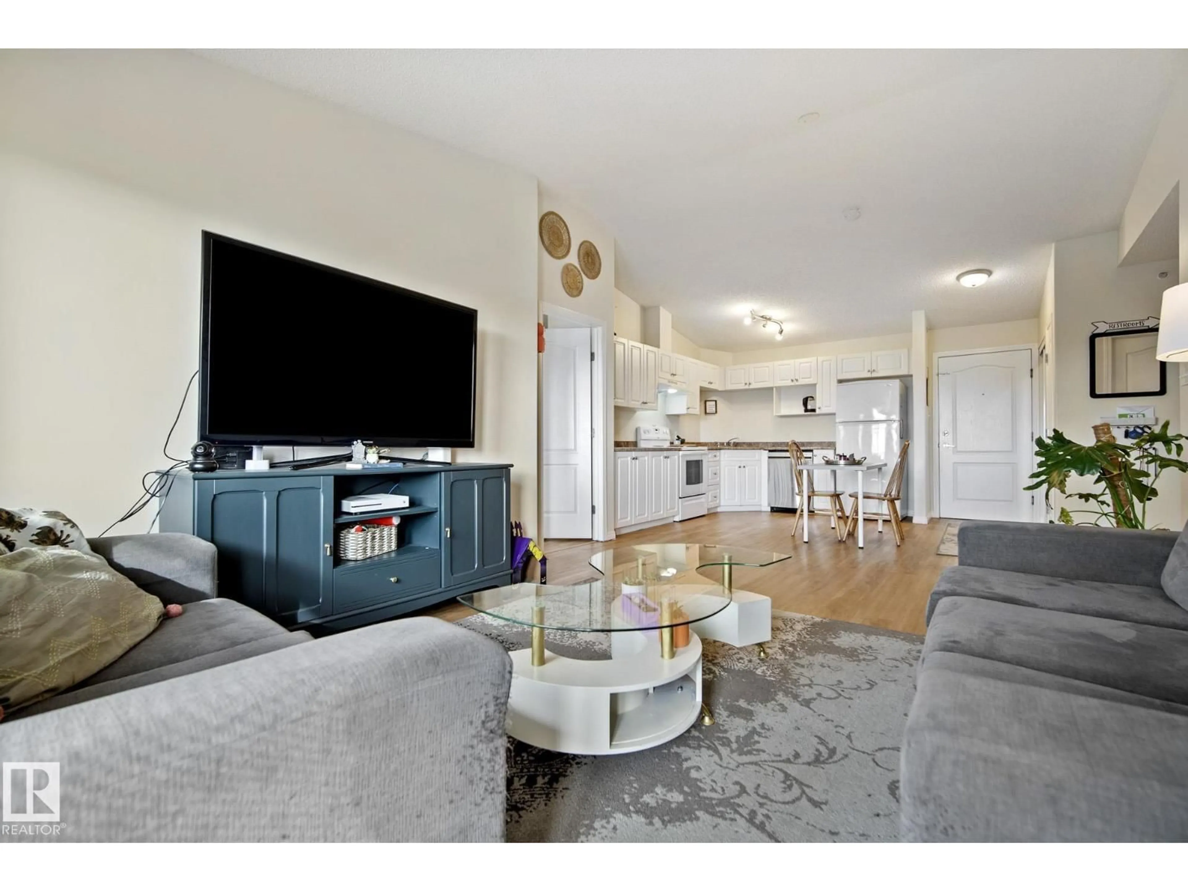 Living room with furniture, unknown for 111 - 416 EDWARDS DR, Edmonton Alberta T6X0C4