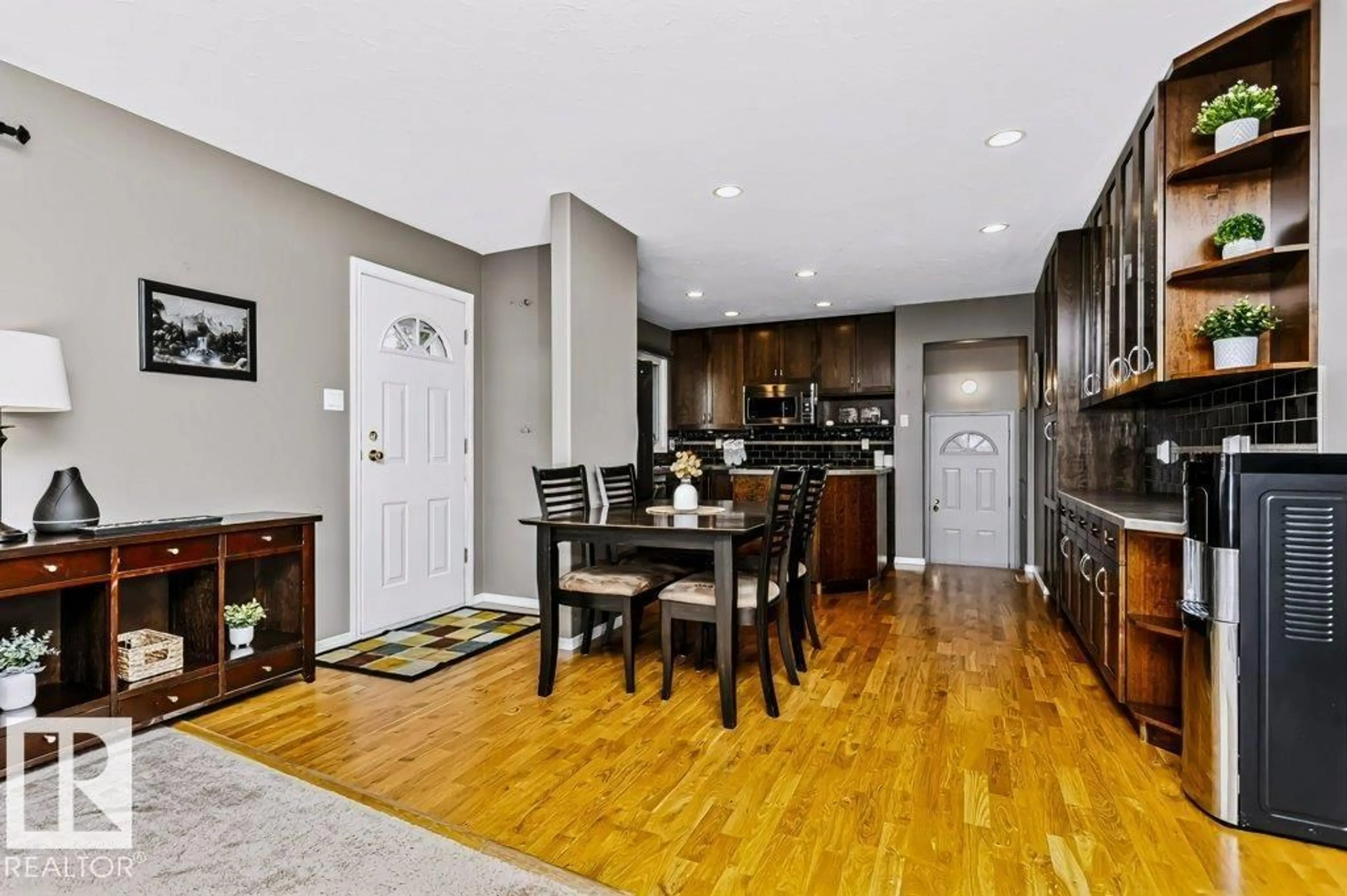 Open concept kitchen, wood/laminate floor for NW - 8104 162 ST, Edmonton Alberta T5R2L7