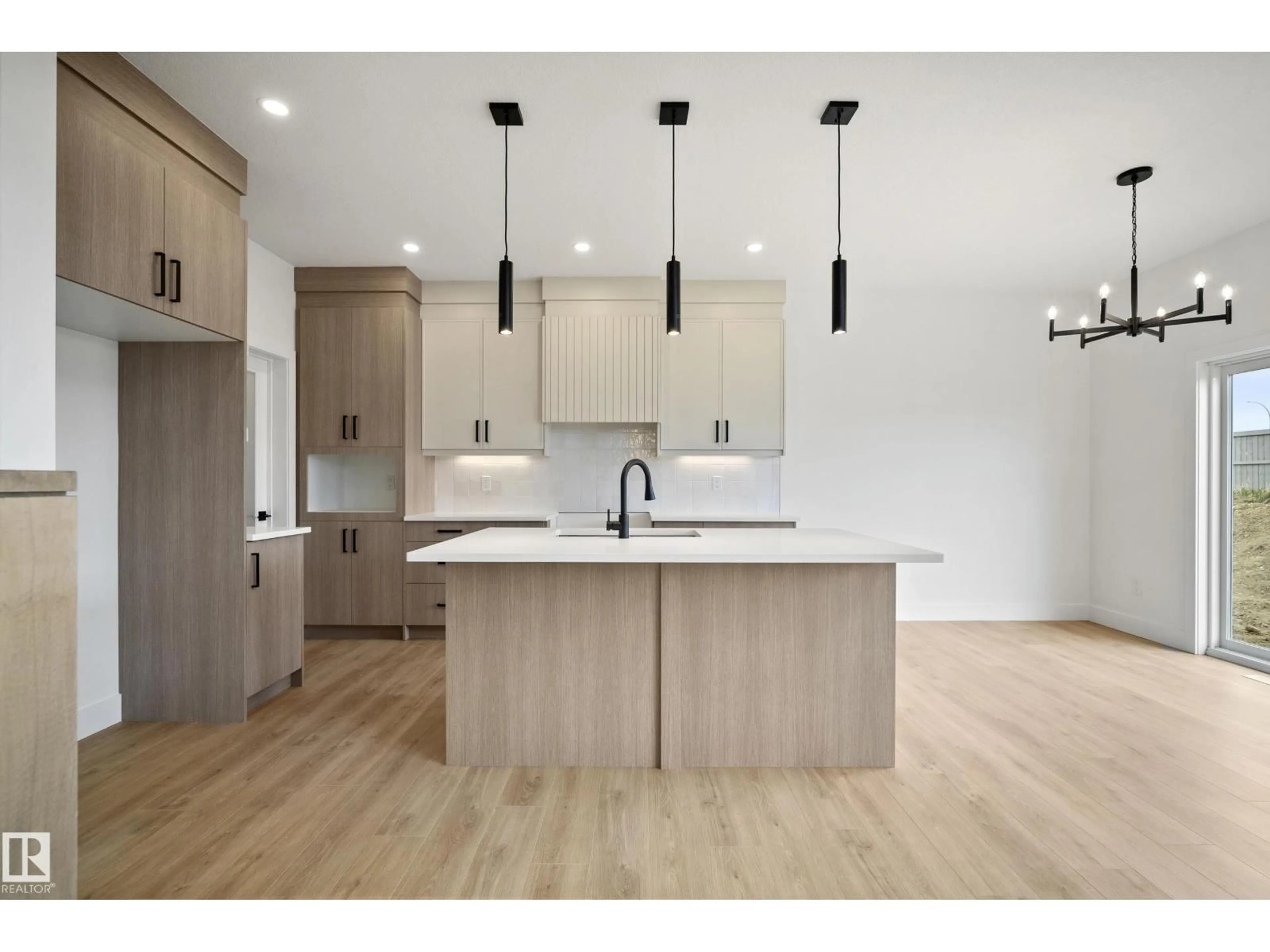 Open concept kitchen, wood/laminate floor for 121 CALEDON CR, Spruce Grove Alberta T7X0Y8