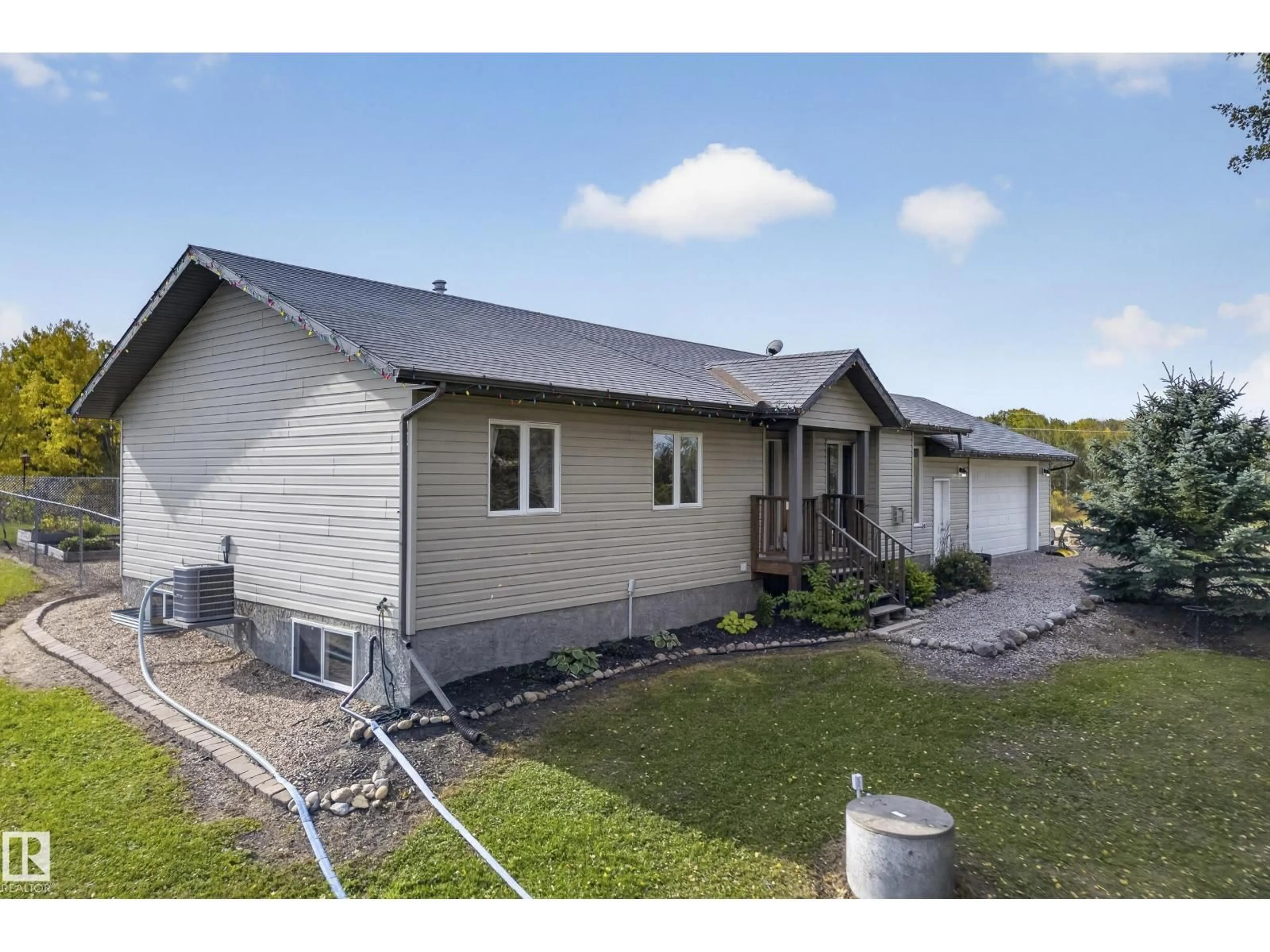 A pic from outside/outdoor area/front of a property/back of a property/a pic from drone, building for 20508 TOWNSHIP ROAD 502, Rural Beaver County Alberta T0B4J2