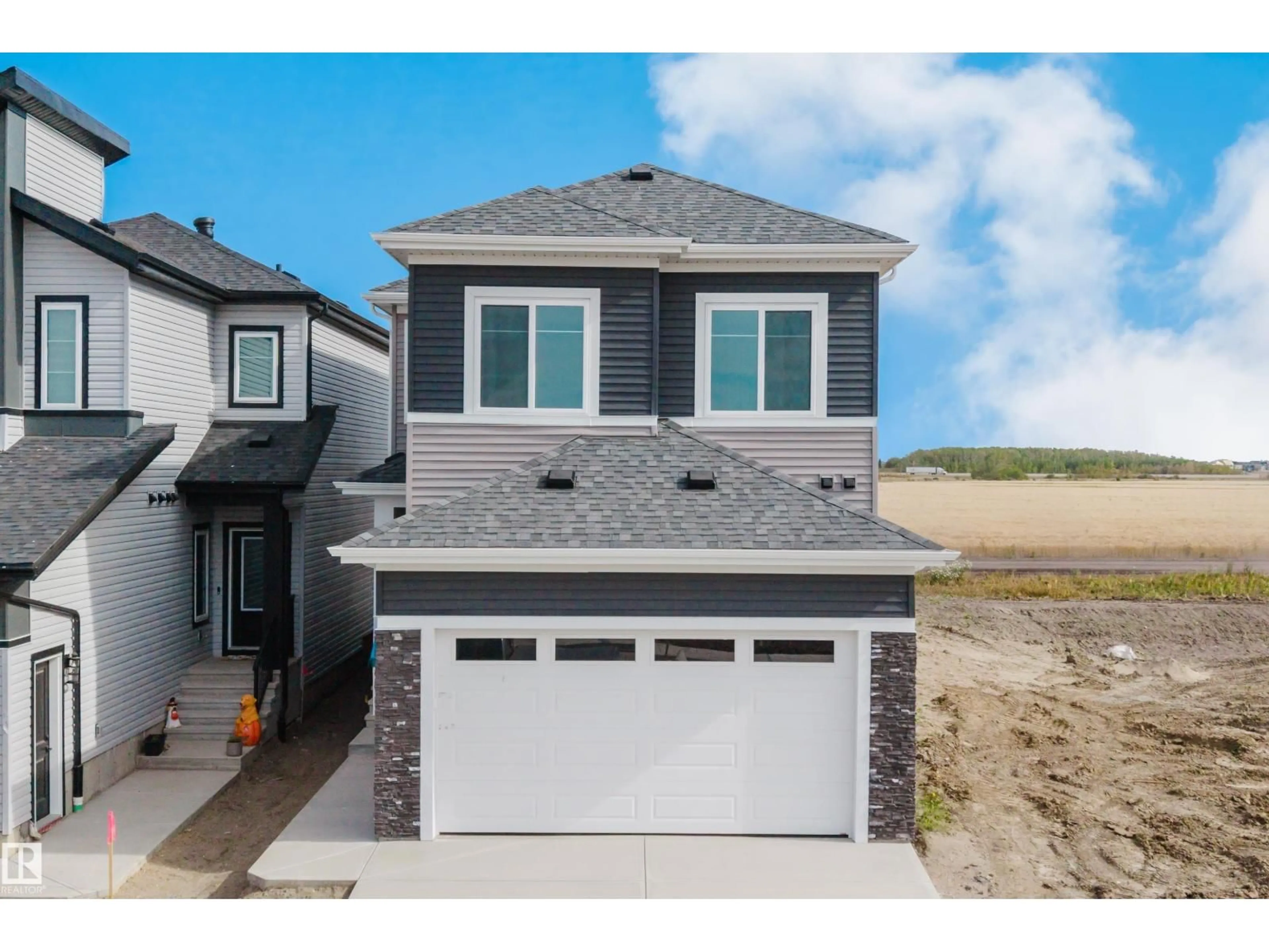 Home with vinyl exterior material, street for 780 BANK DR, Leduc Alberta T9E1G2