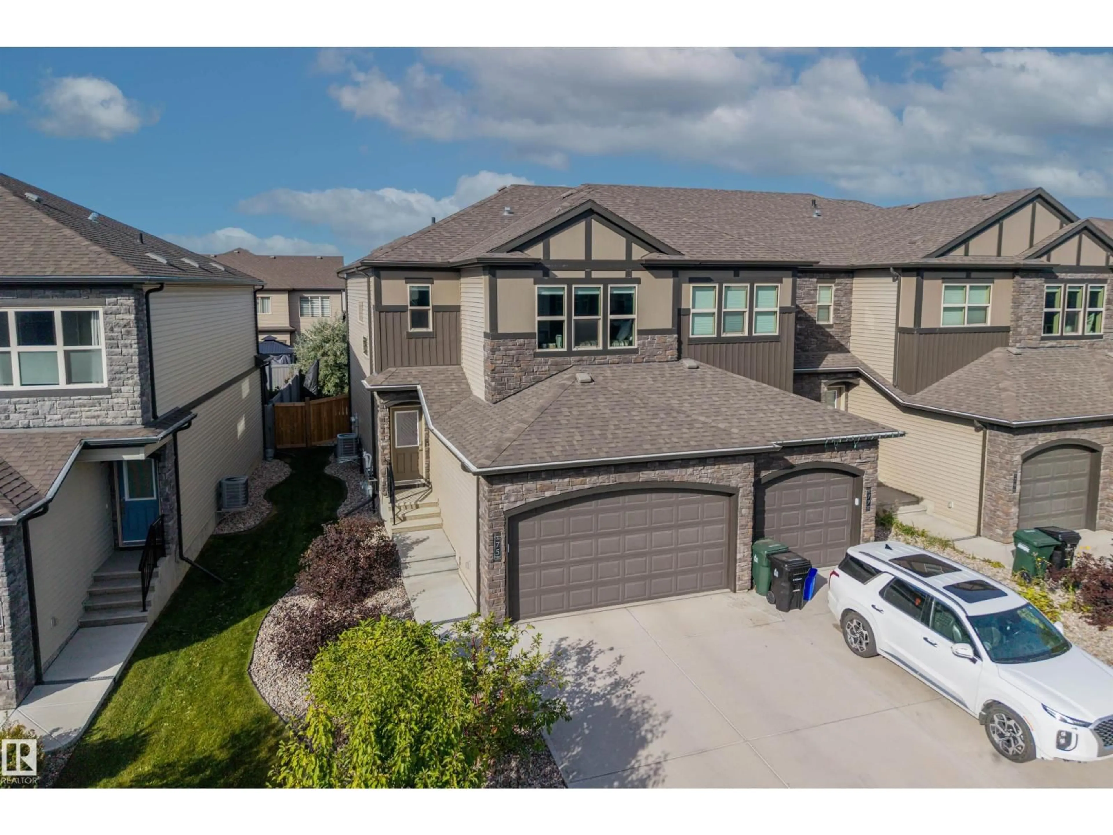 A pic from outside/outdoor area/front of a property/back of a property/a pic from drone, street for 75 GARNEAU GA, Spruce Grove Alberta T7X0Z7
