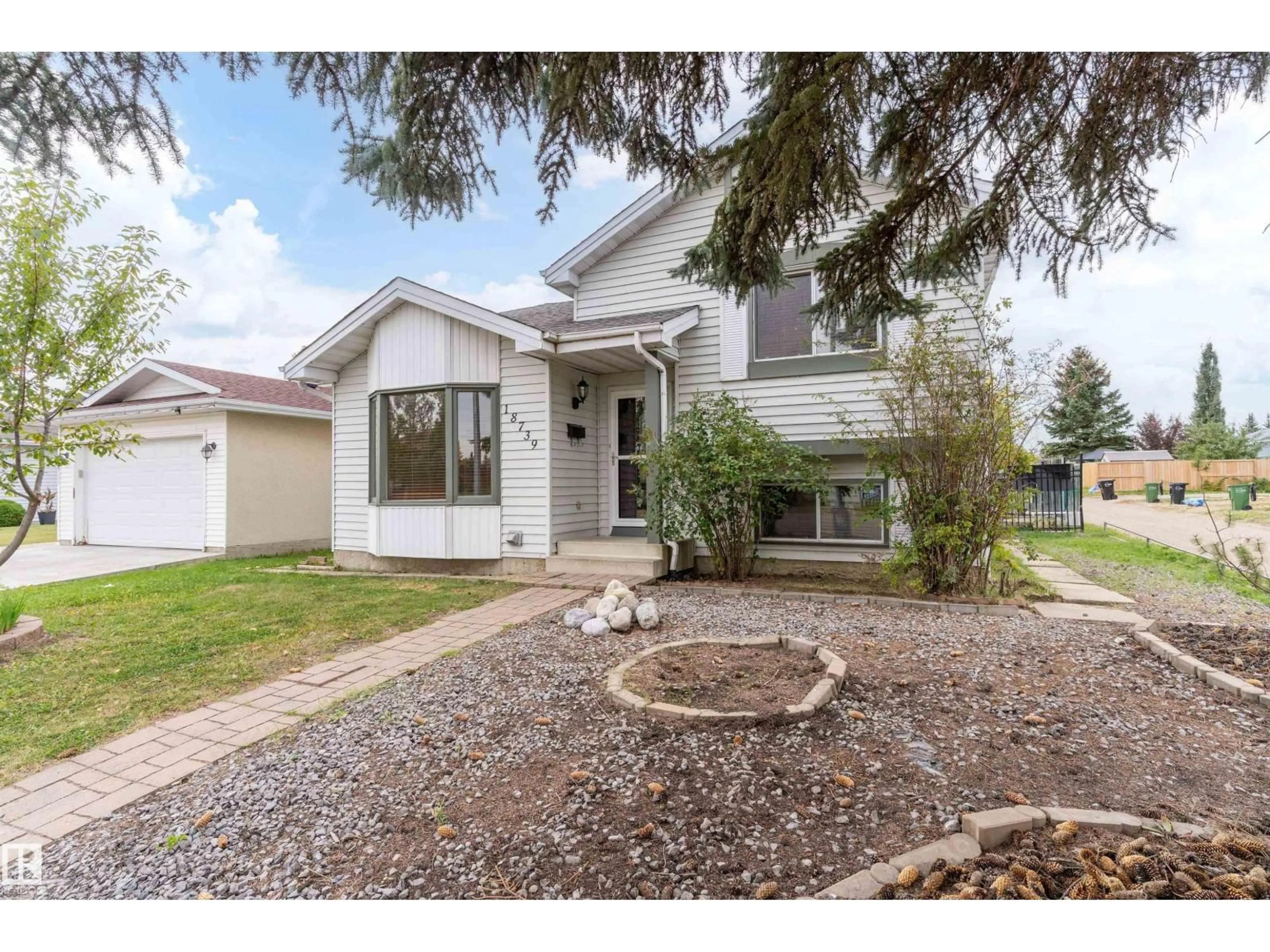 Home with vinyl exterior material, street for 18739 72 AV, Edmonton Alberta T5T5E7