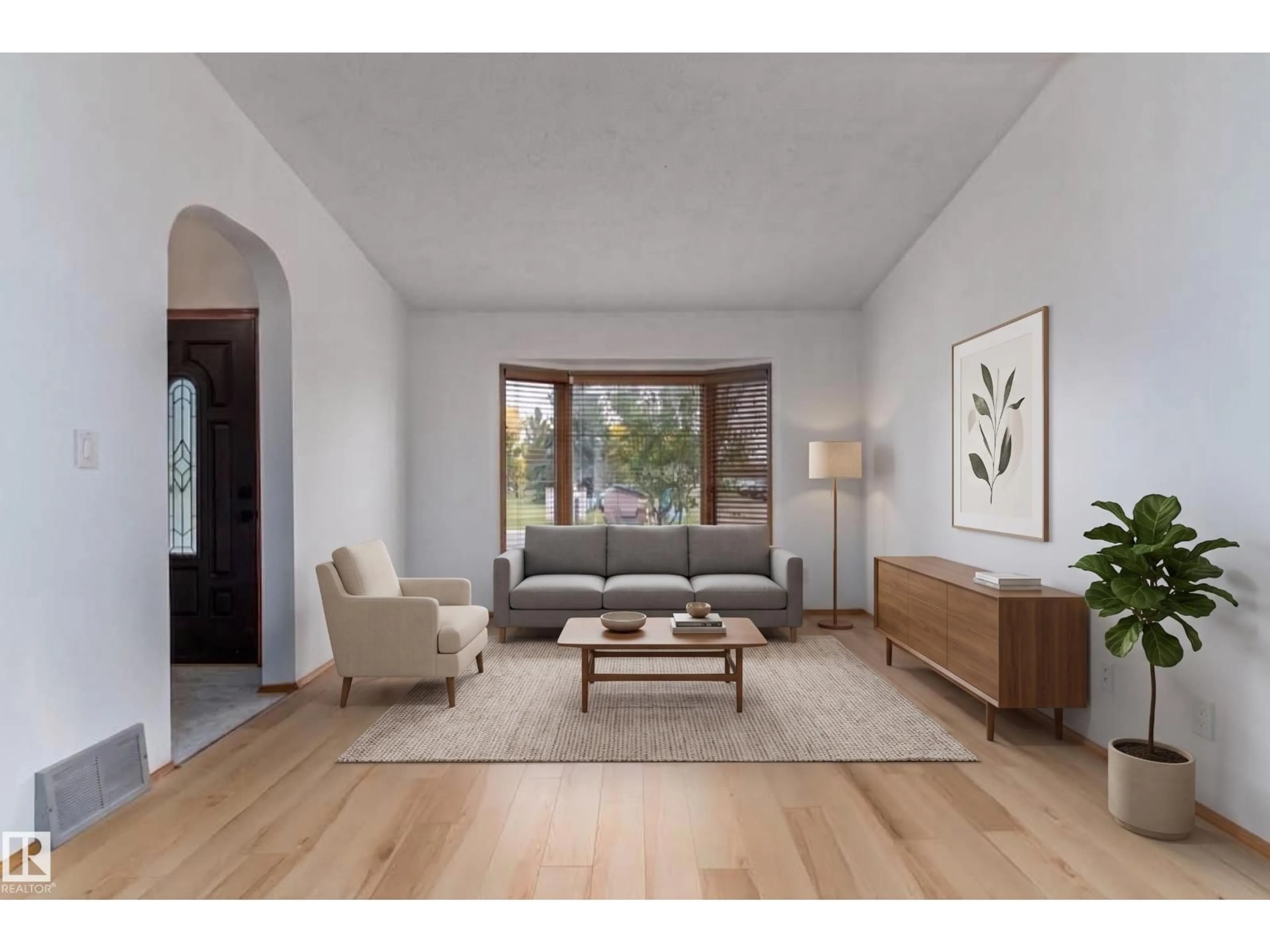 Living room with furniture, wood/laminate floor for 18739 72 AV, Edmonton Alberta T5T5E7