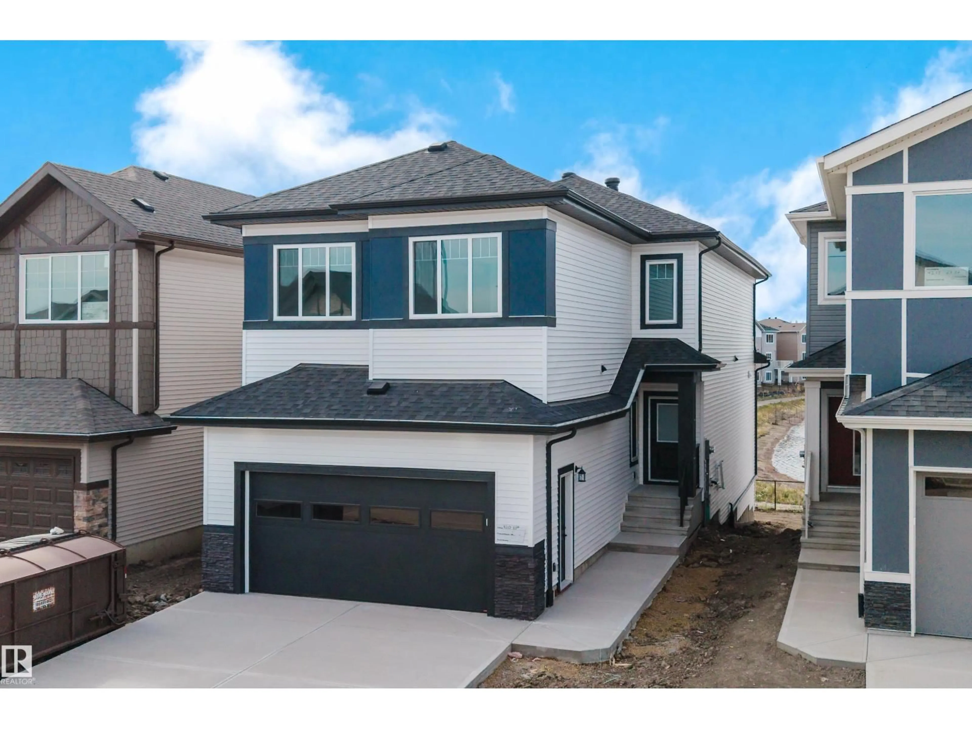 Home with vinyl exterior material, street for 4210 63 ST, Beaumont Alberta T4X0V1