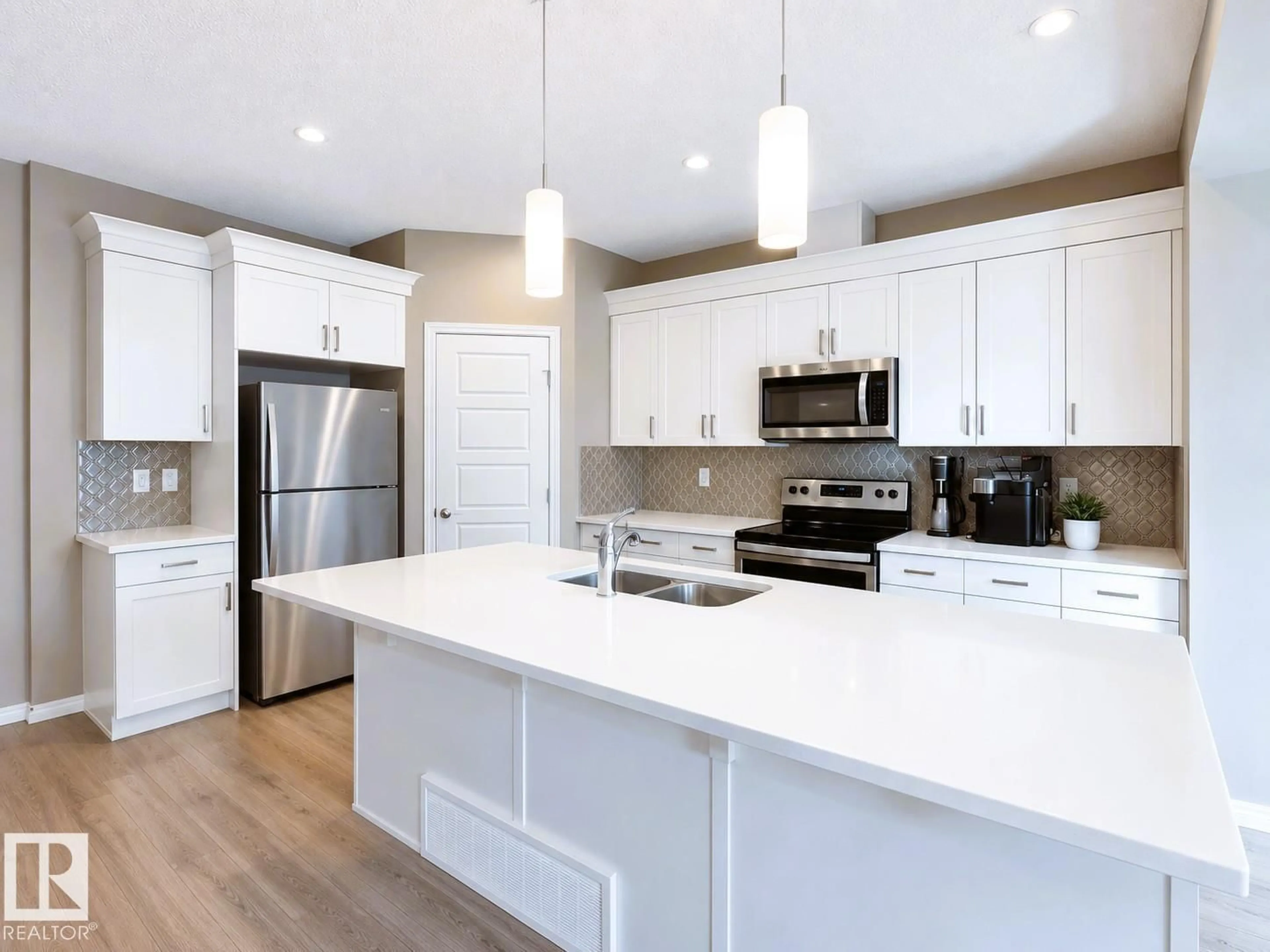 Open concept kitchen, unknown for NW - 20104 19 AV, Edmonton Alberta T6M0X9
