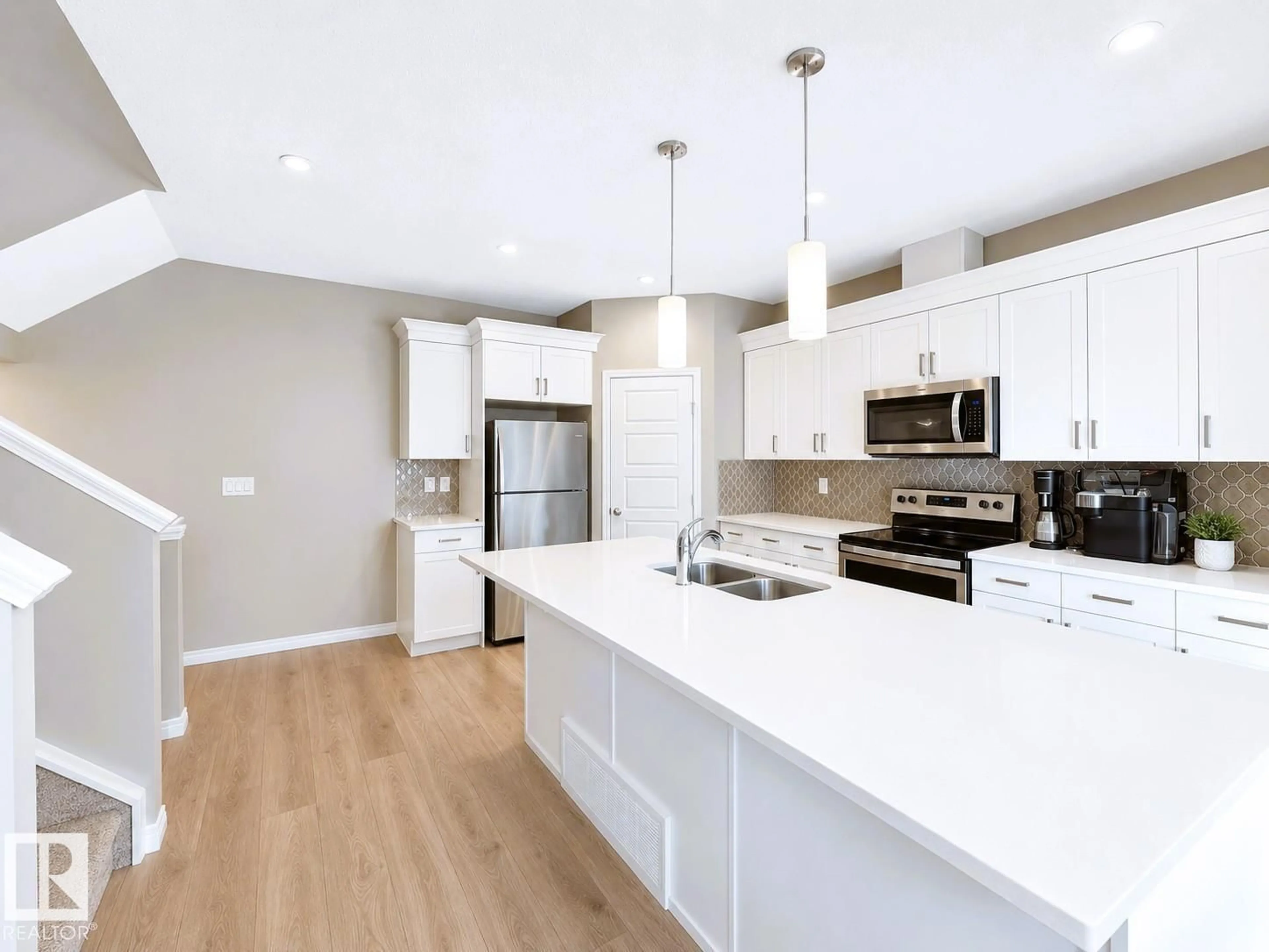 Open concept kitchen, unknown for NW - 20104 19 AV, Edmonton Alberta T6M0X9