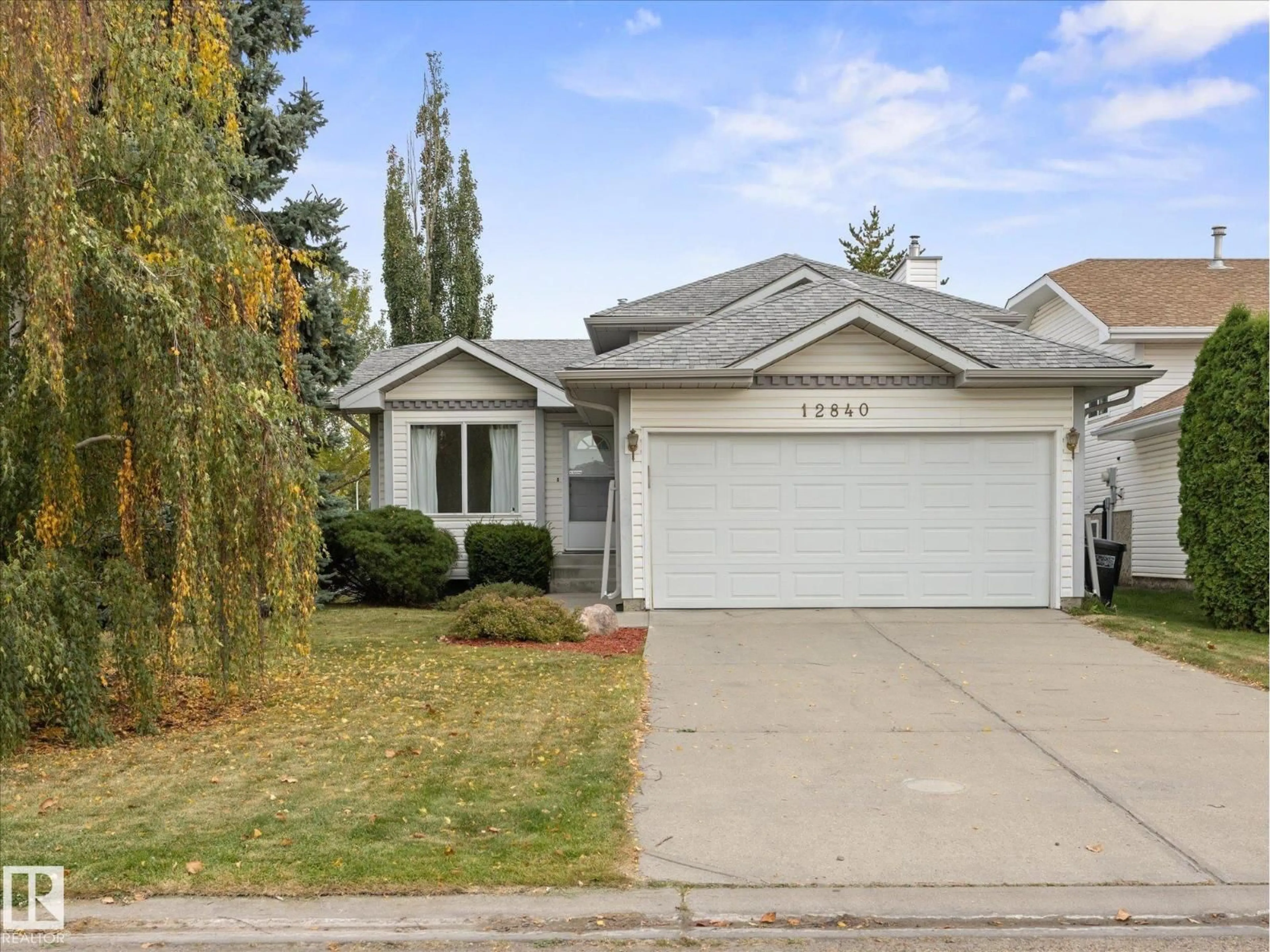 Home with vinyl exterior material, street for 12840 147 AV, Edmonton Alberta T6V1C5