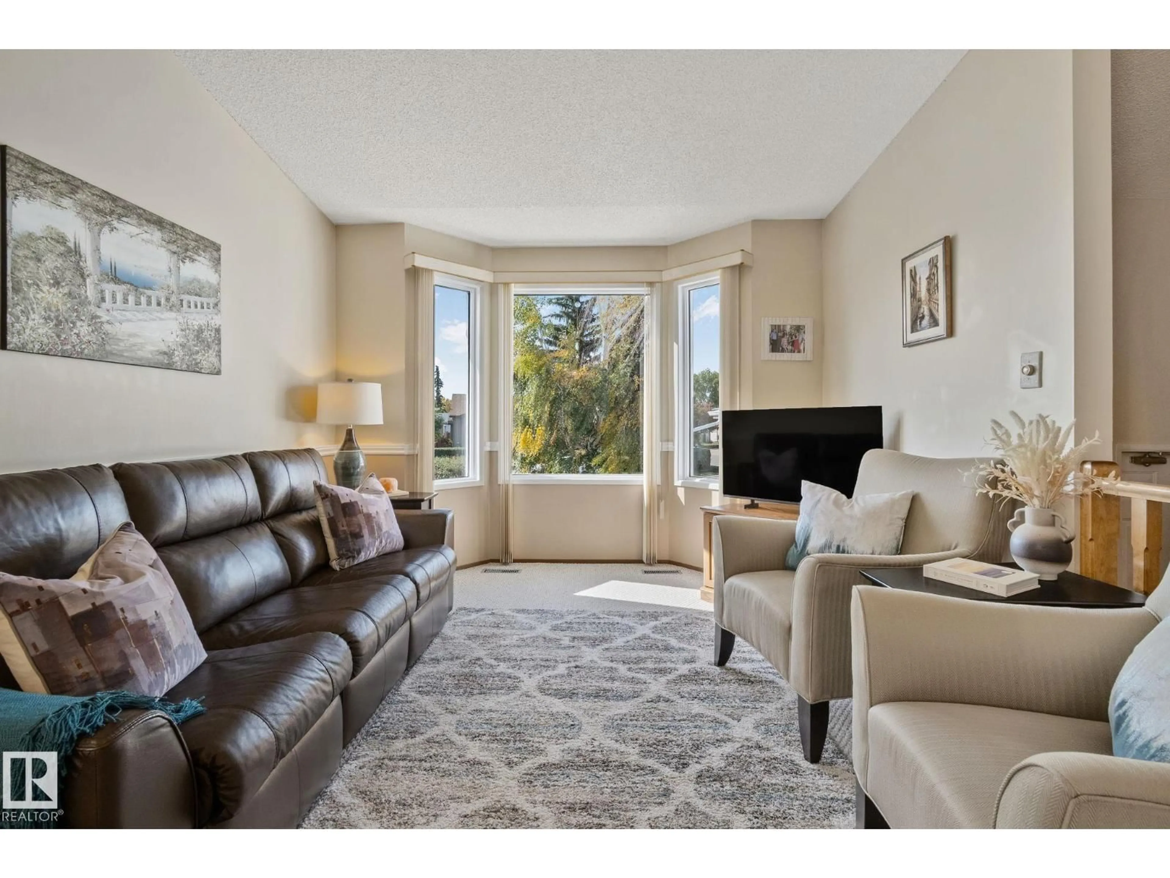 Living room with furniture, unknown for 9532 175 AV NW, Edmonton Alberta T5Z2B6