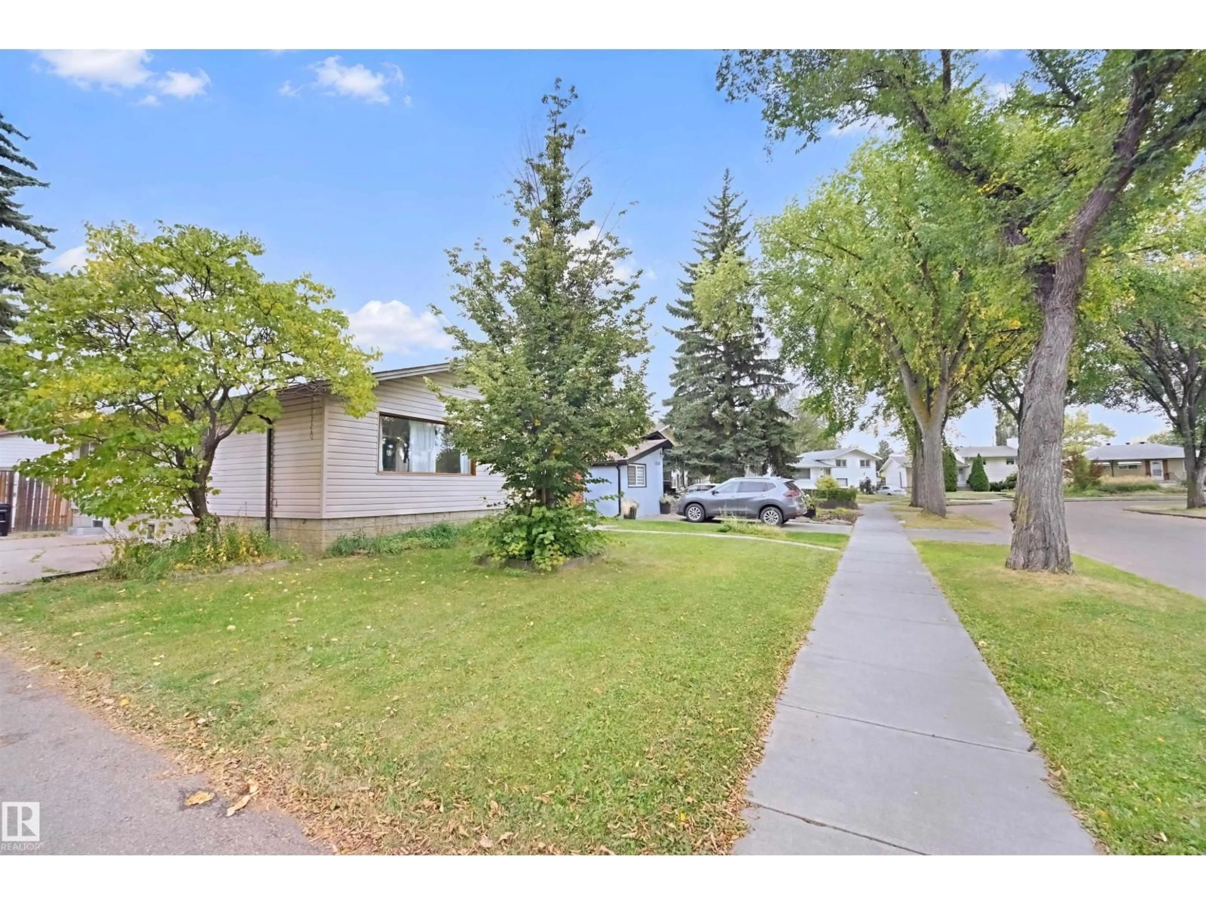 A pic from outside/outdoor area/front of a property/back of a property/a pic from drone, street for 13420 117 AV, Edmonton Alberta T5M3H7