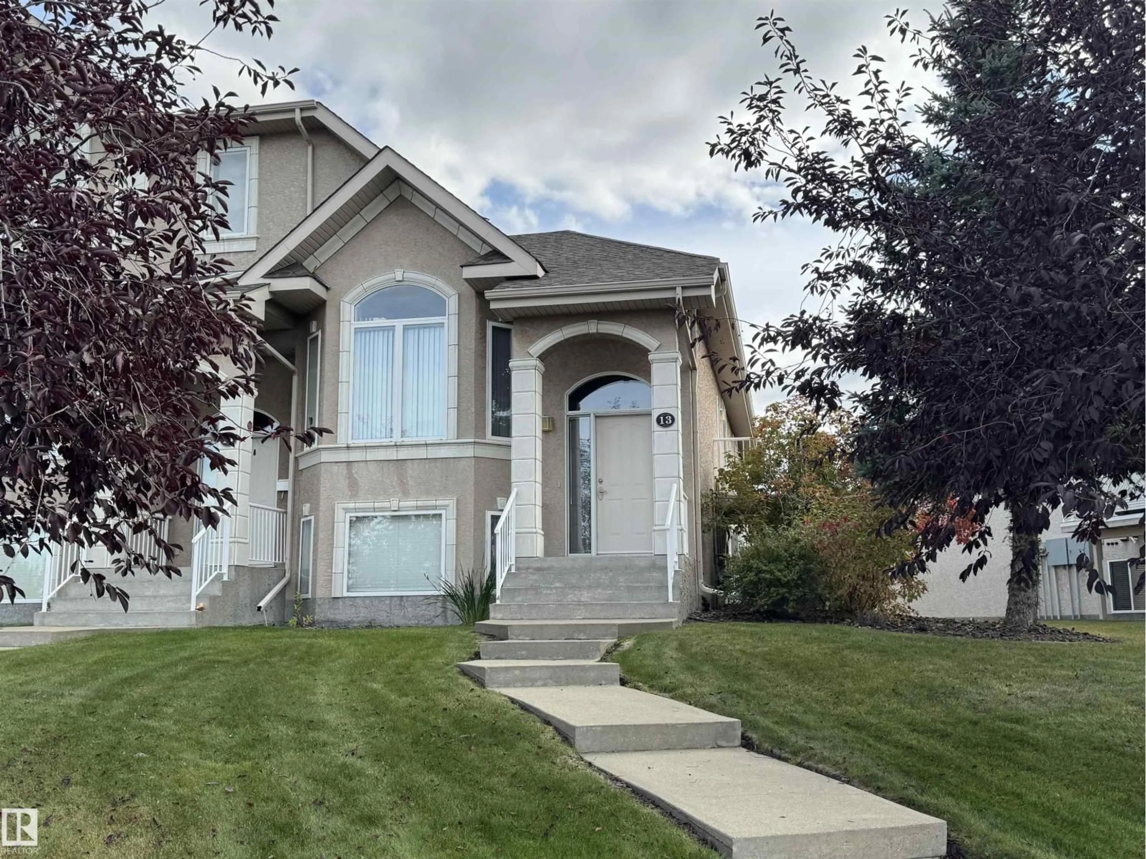 Home with vinyl exterior material, street for 13 101 JIM COMMON DR, Sherwood Park Alberta T8H2M1