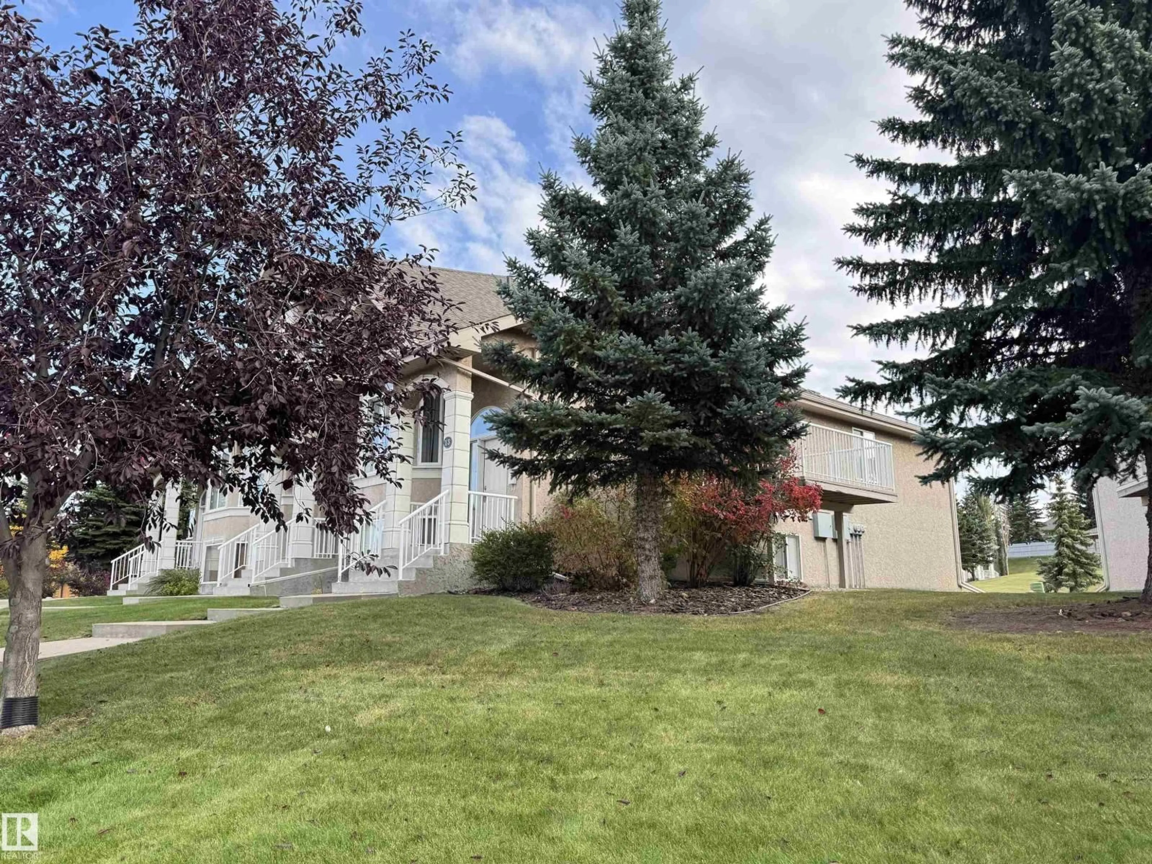 A pic from outside/outdoor area/front of a property/back of a property/a pic from drone, mountain view for 13 101 JIM COMMON DR, Sherwood Park Alberta T8H2M1