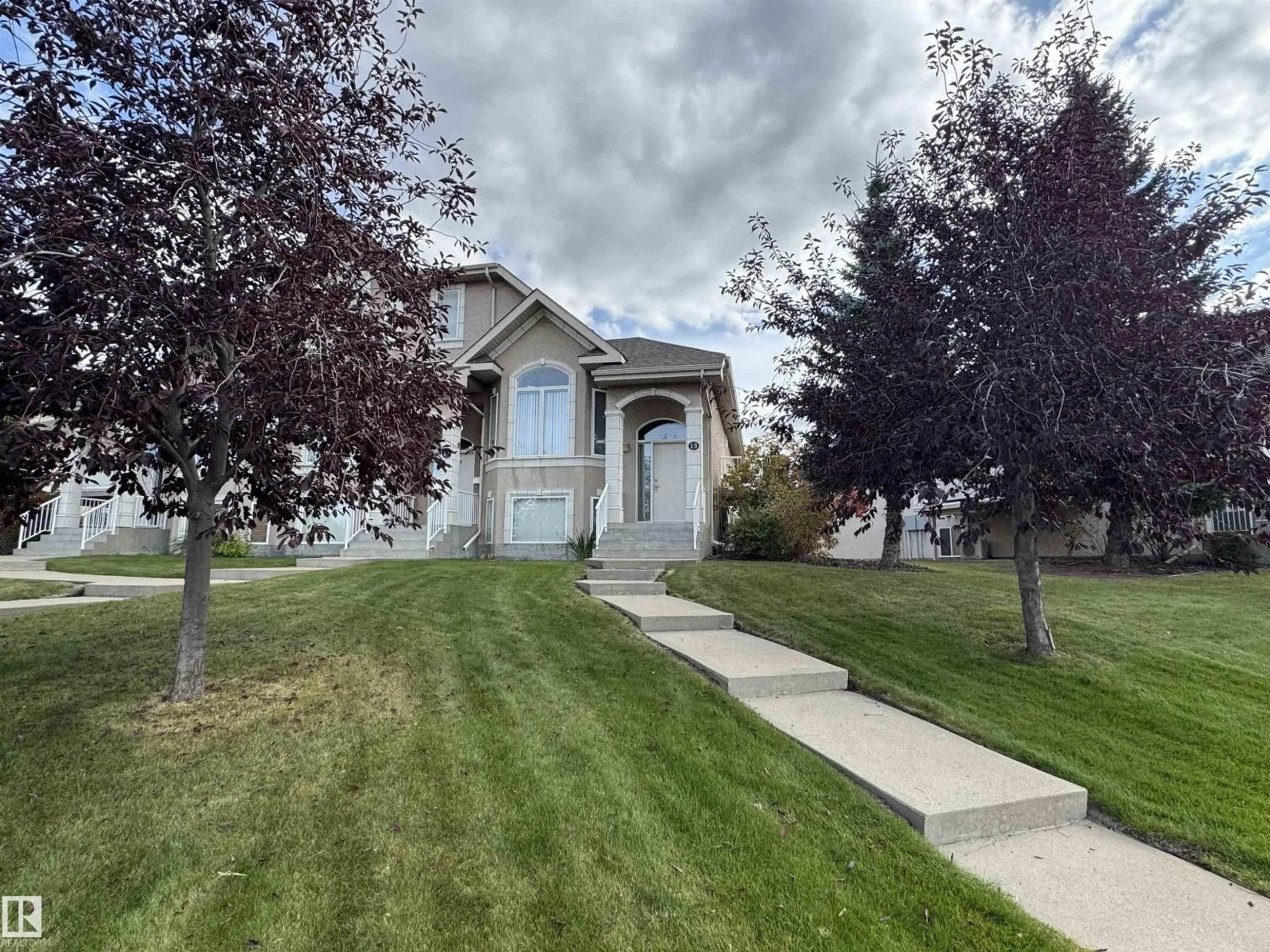 A pic from outside/outdoor area/front of a property/back of a property/a pic from drone, street for 13 101 JIM COMMON DR, Sherwood Park Alberta T8H2M1