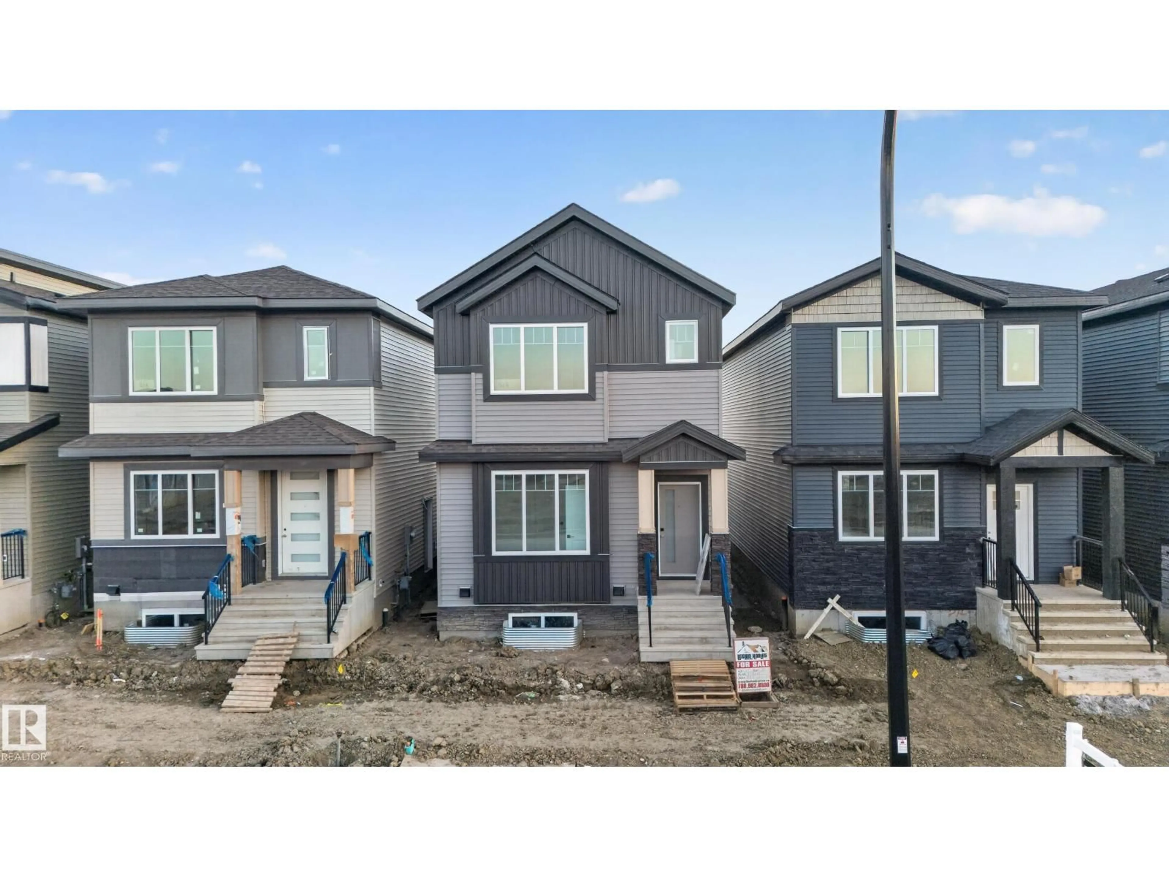 A pic from outside/outdoor area/front of a property/back of a property/a pic from drone, street for 514 ROBINSON BLVD, Leduc Alberta T9E1P8