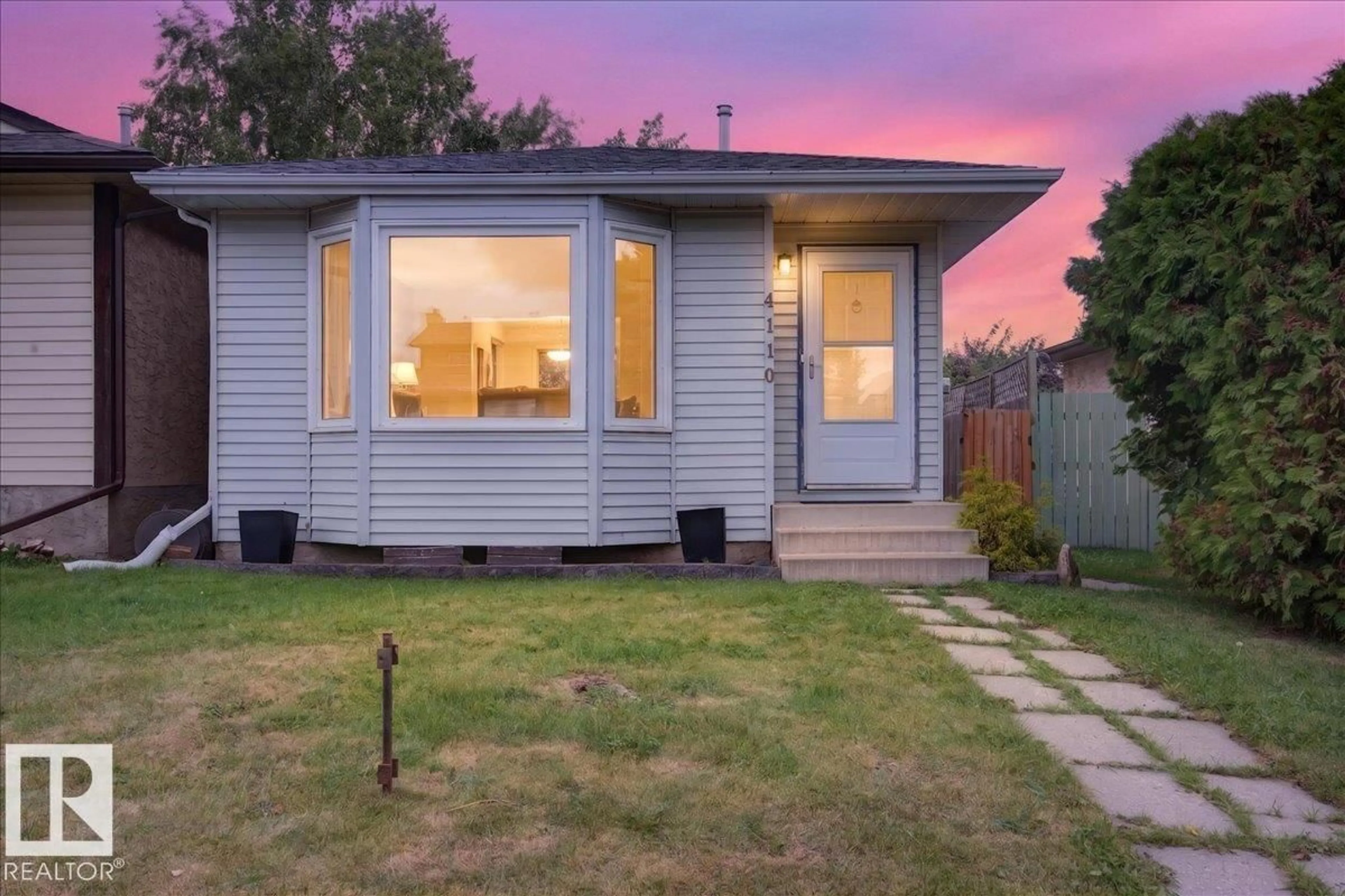 Home with vinyl exterior material, street for 4110 35 ST, Edmonton Alberta T6L5S3