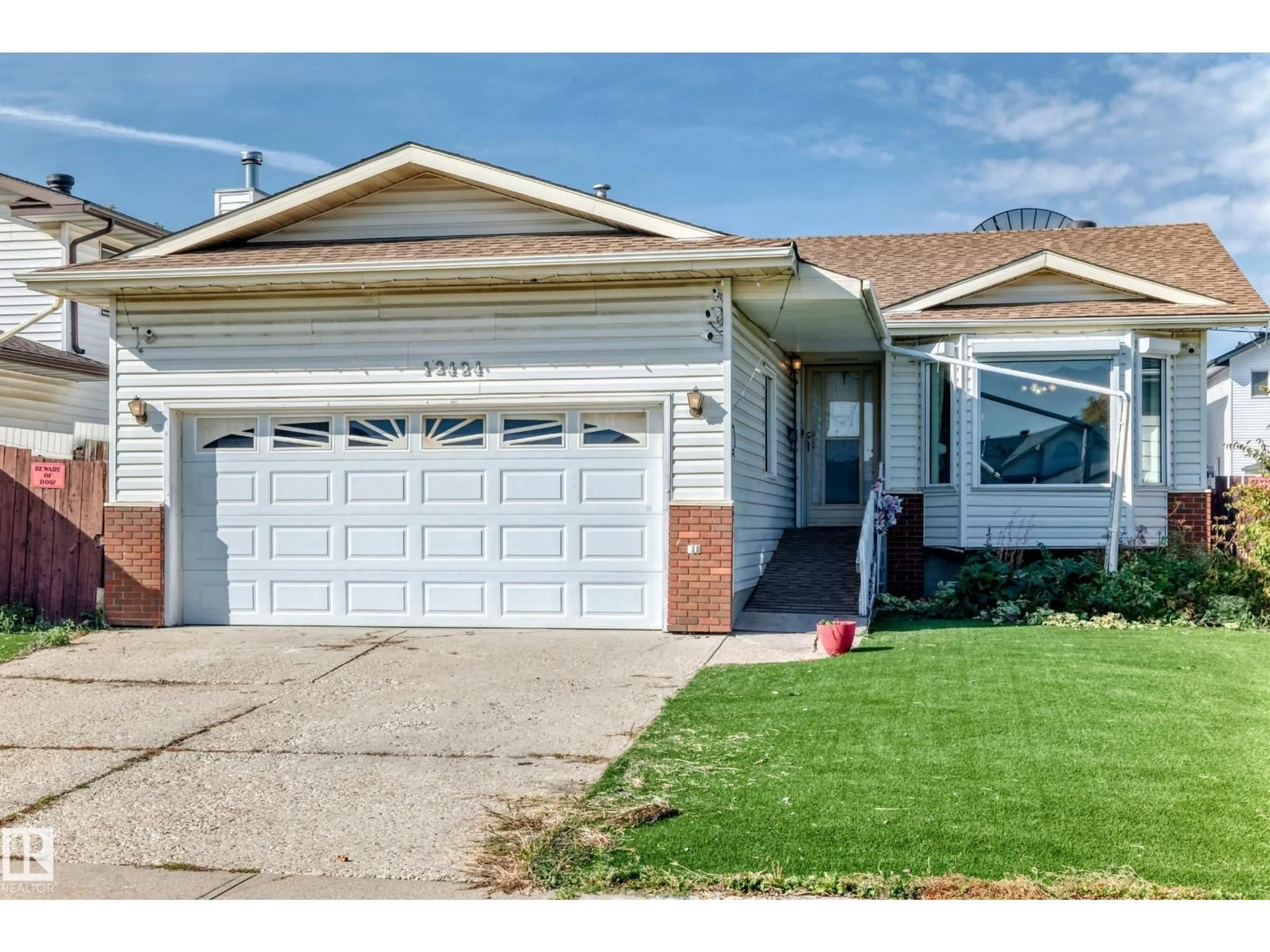 Home with vinyl exterior material, street for NW - 12424 46 ST, Edmonton Alberta T5W5E3