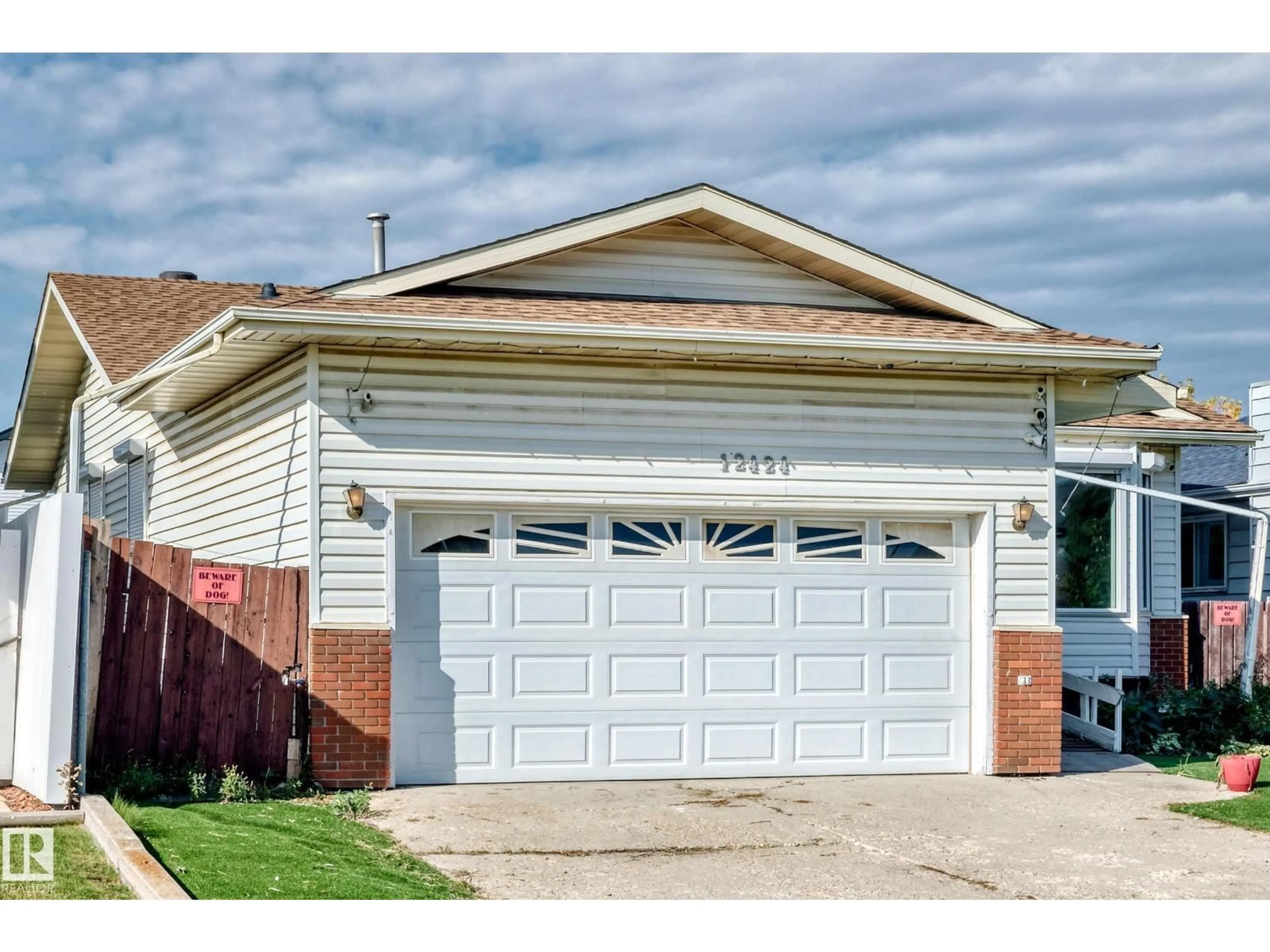 Home with vinyl exterior material, street for NW - 12424 46 ST, Edmonton Alberta T5W5E3
