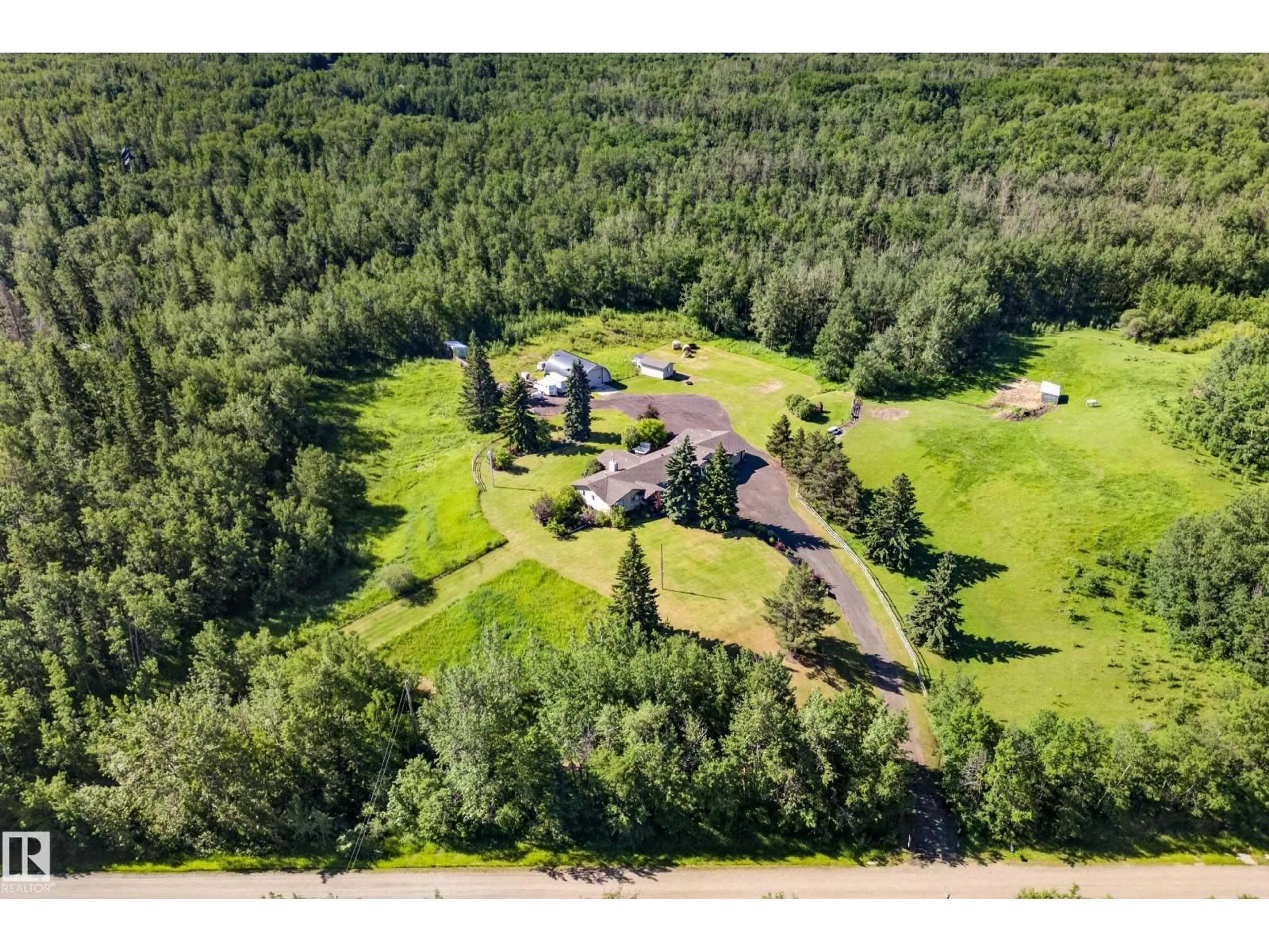 A pic from outside/outdoor area/front of a property/back of a property/a pic from drone, forest/trees view for 22245 TWP ROAD 512, Rural Strathcona County Alberta T8C1H2
