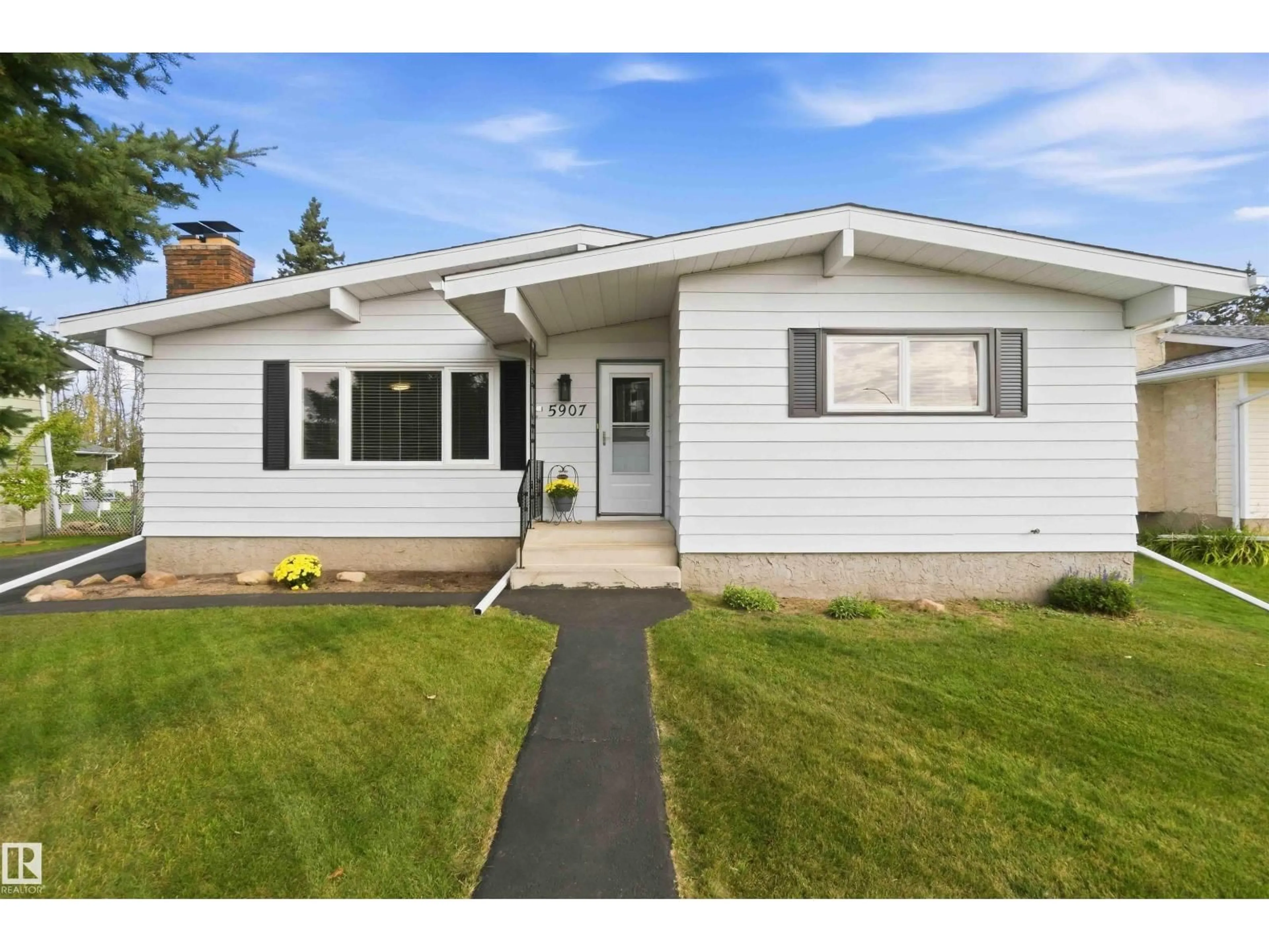 Home with vinyl exterior material, street for 5907 53A AV, Redwater Alberta T0A2W0