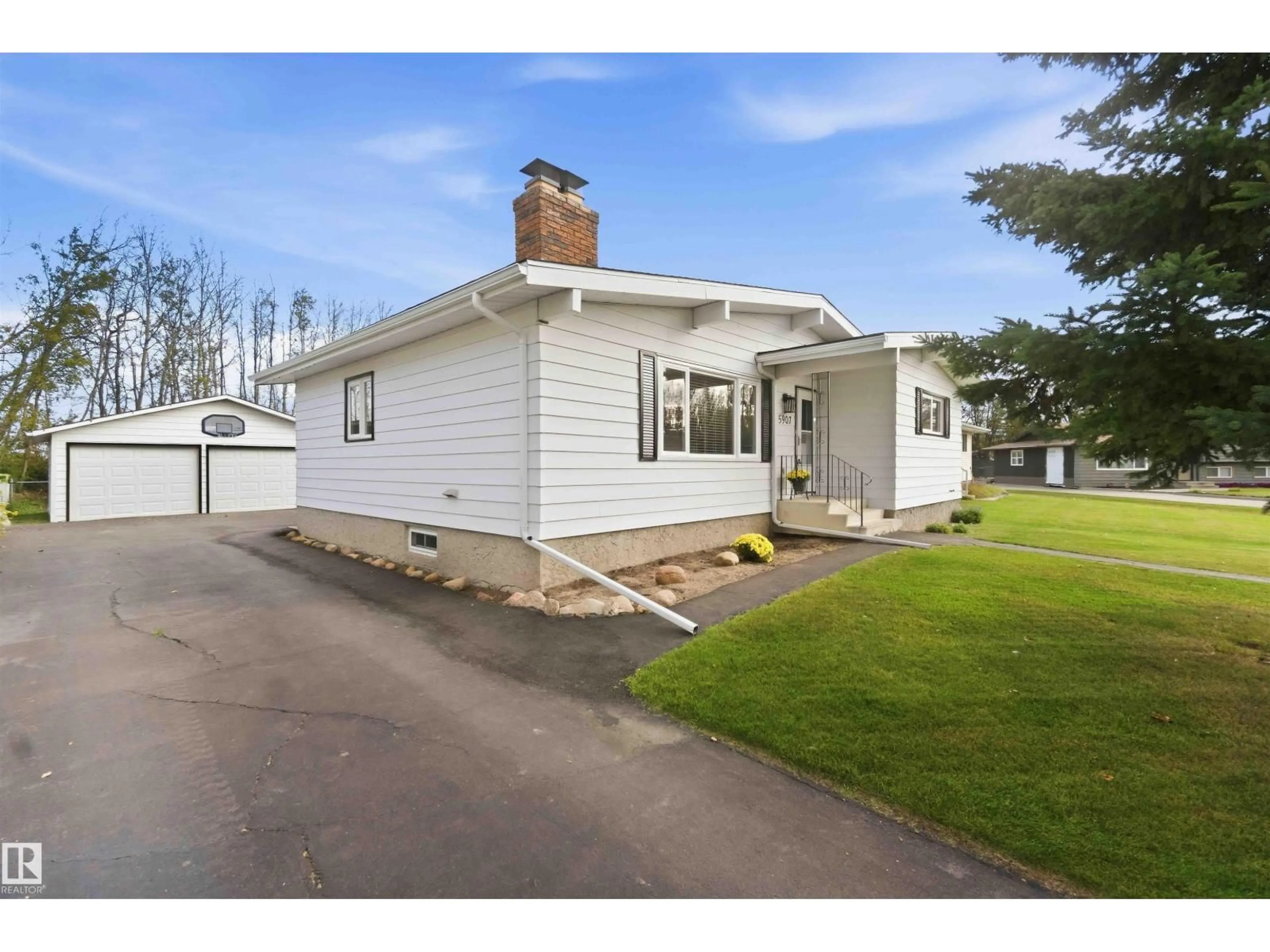 Home with vinyl exterior material, street for 5907 53A AV, Redwater Alberta T0A2W0