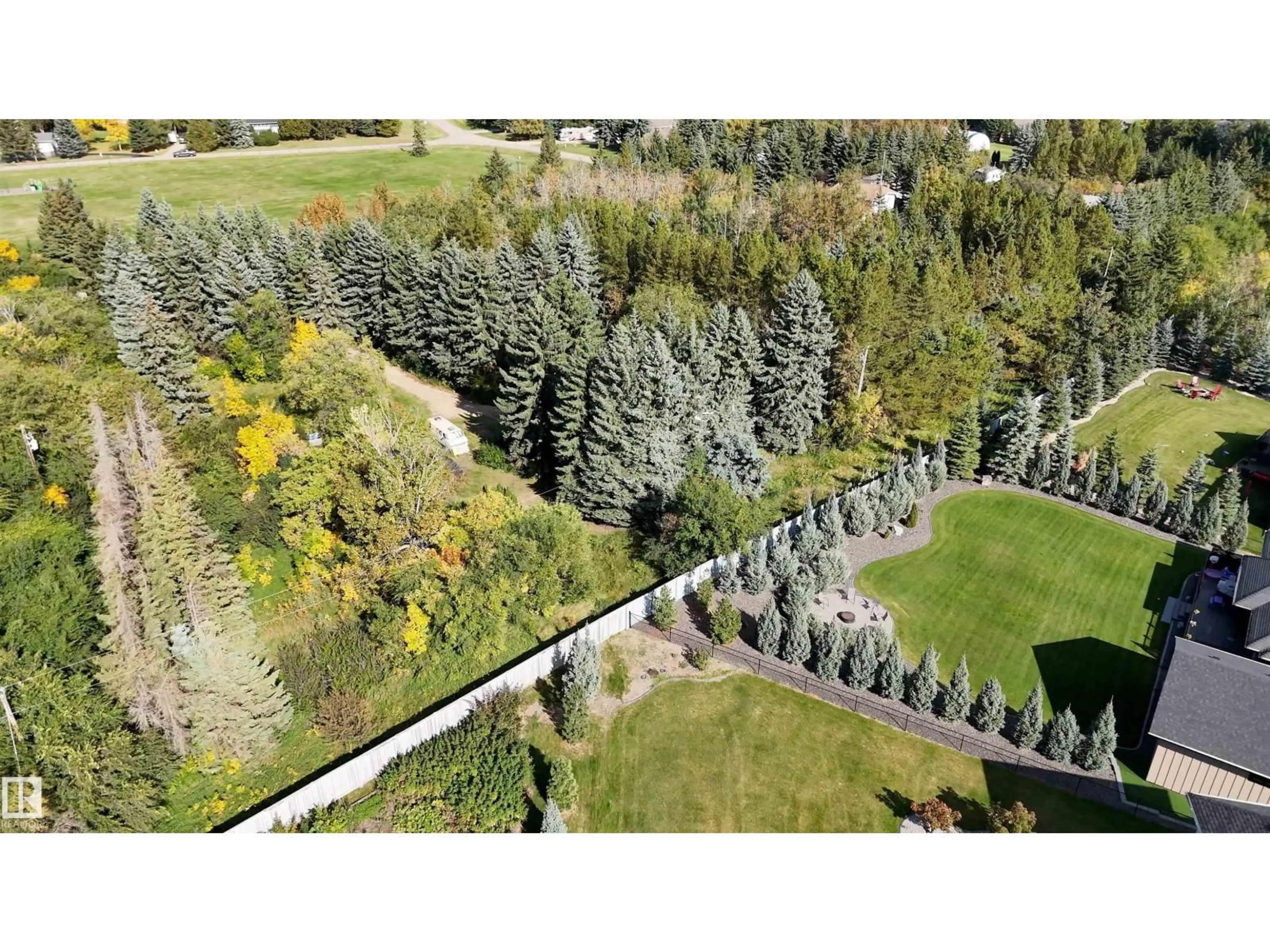A pic from outside/outdoor area/front of a property/back of a property/a pic from drone, forest/trees view for 25011 - 19 STURGEON RD, Rural Sturgeon County Alberta T8T0A3
