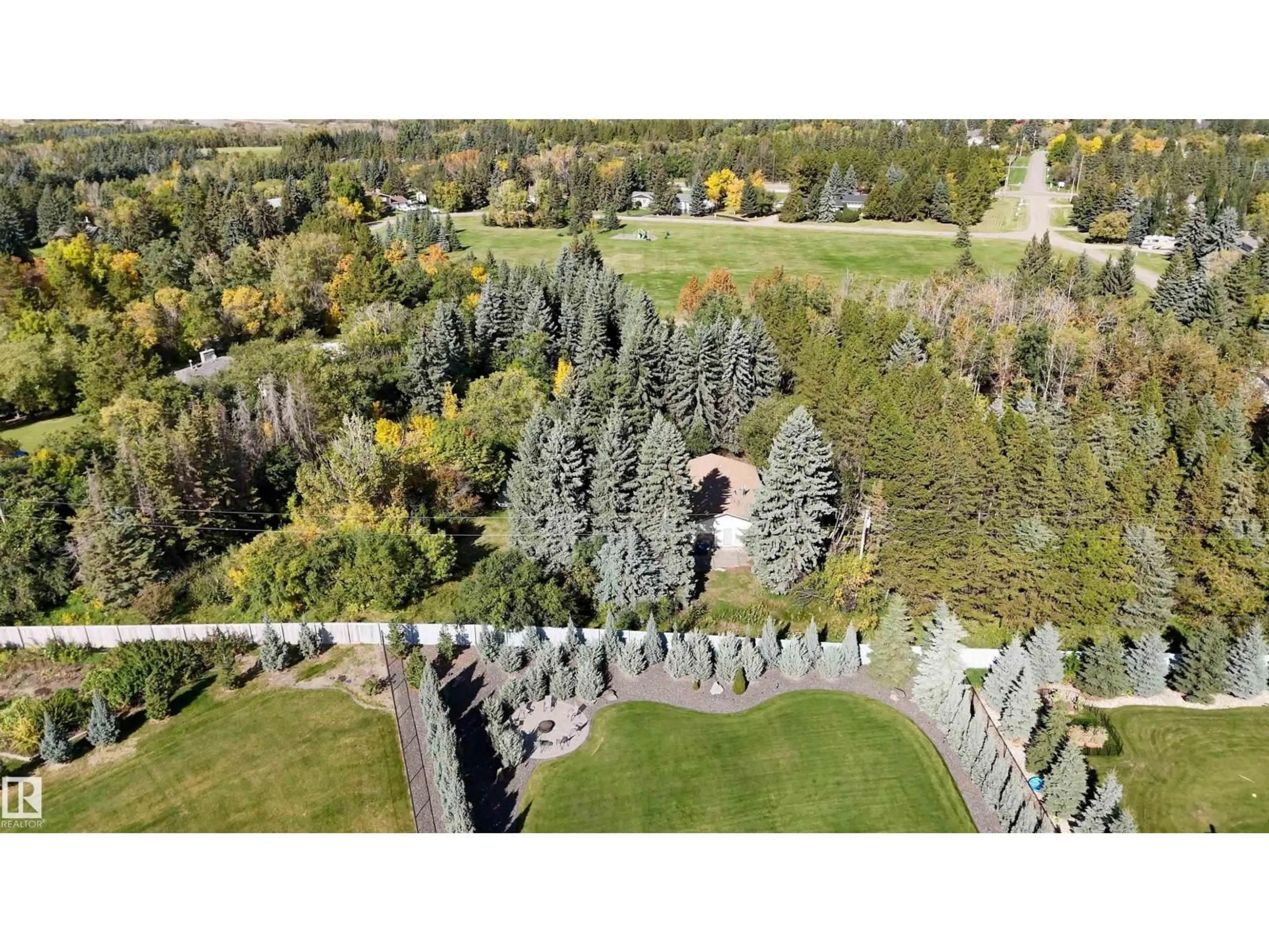 A pic from outside/outdoor area/front of a property/back of a property/a pic from drone, forest/trees view for 25011 - 19 STURGEON RD, Rural Sturgeon County Alberta T8T0A3