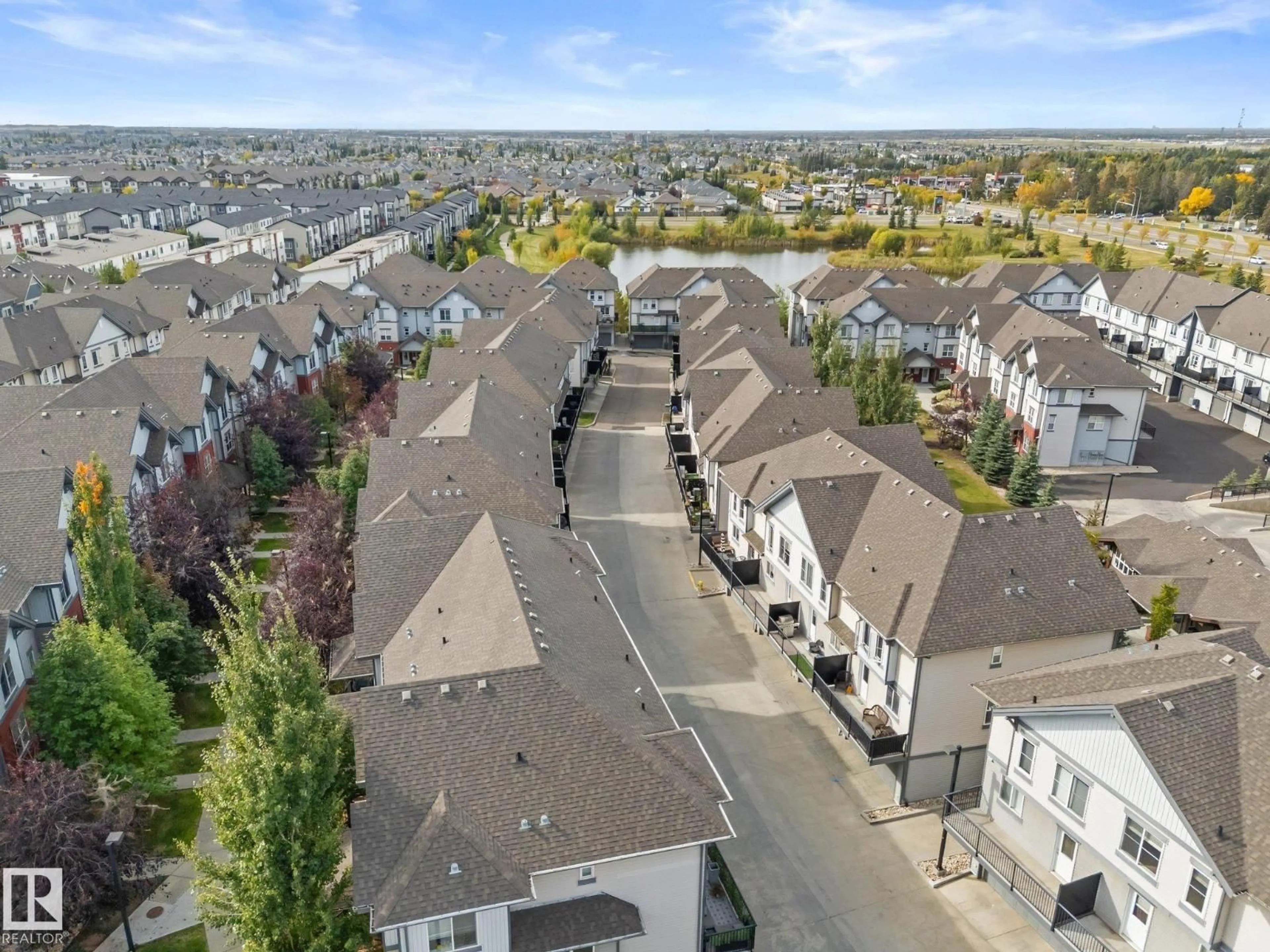 A pic from outside/outdoor area/front of a property/back of a property/a pic from drone, street for #40 - 655 WATT BV, Edmonton Alberta T6X0Y2